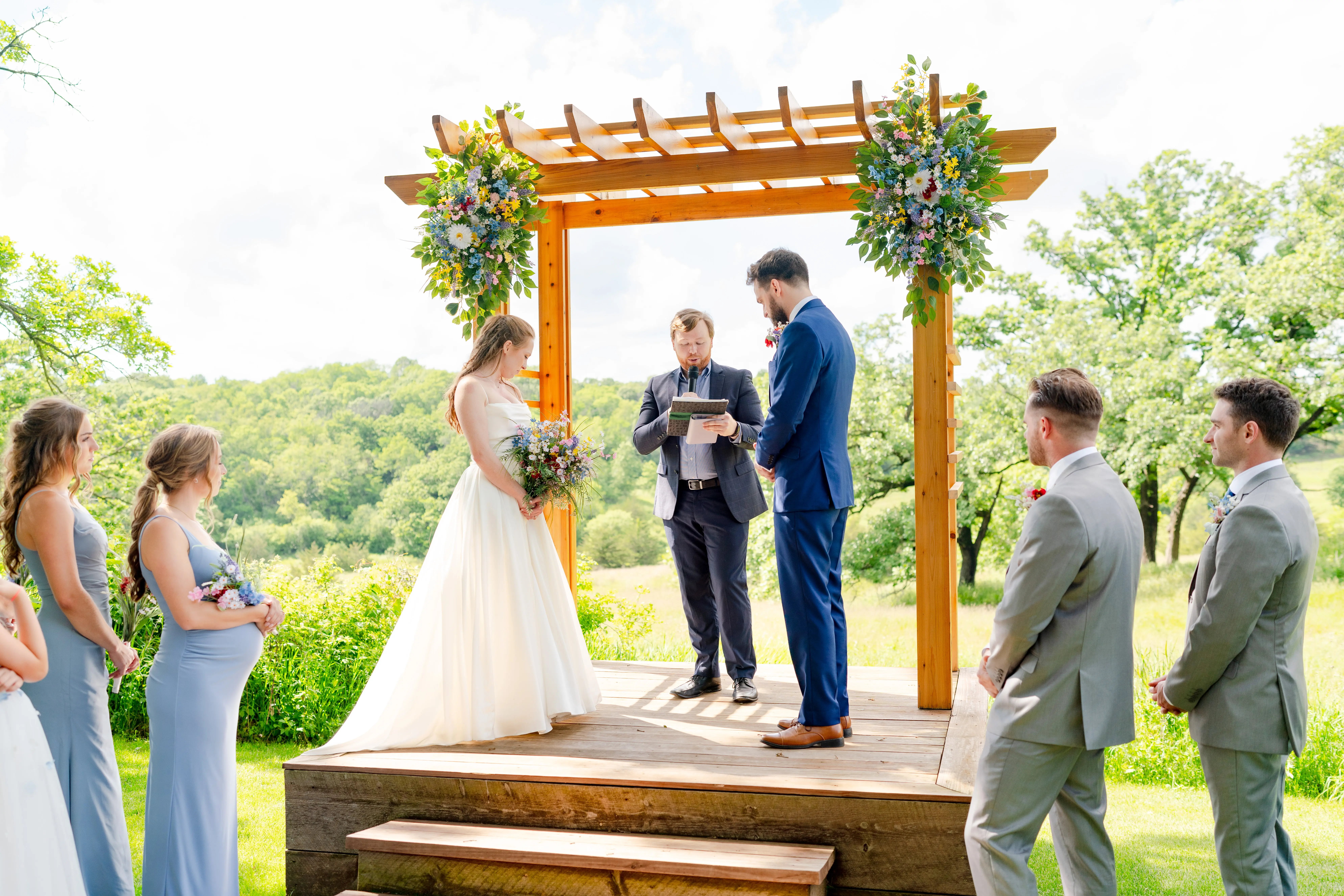 Bride wearing Scarlet by Maggie Sottero being married