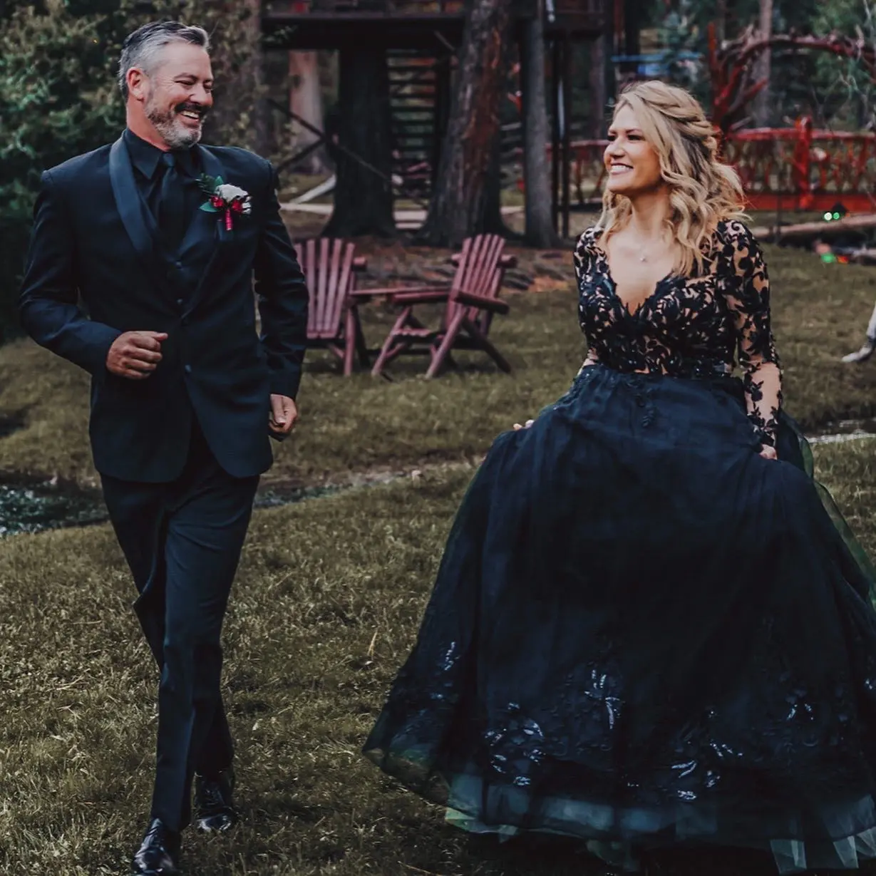 Bride Wearing Black Lace Ballgown Wedding Dress Called Zander By Sottero And Midgley Walking With Groom