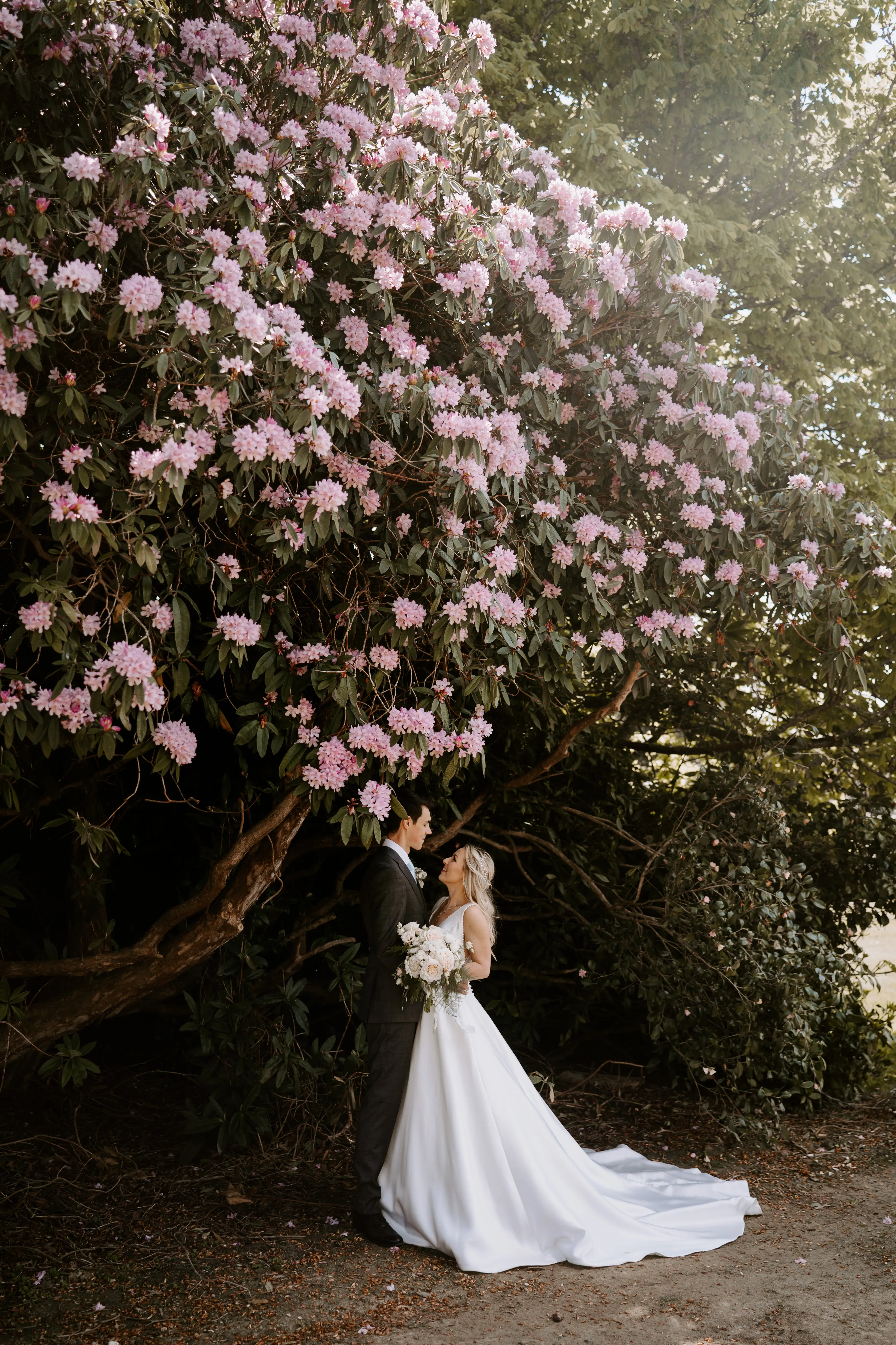 Groom With Bride Wearing Mikado A-Line Wedding Dress Raven By Maggie Sottero
