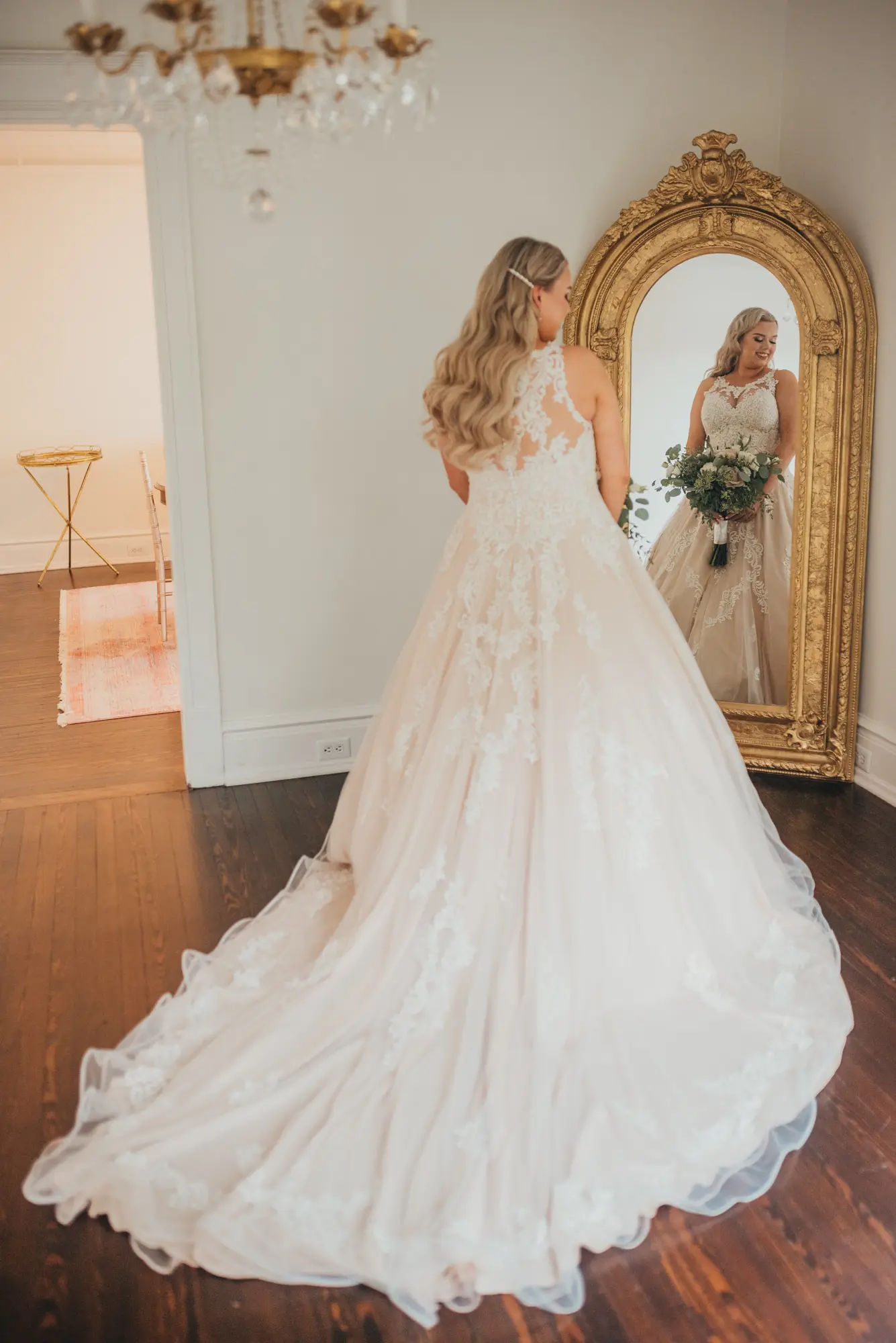 Bride wearing a plus size ballgown wedding dress.