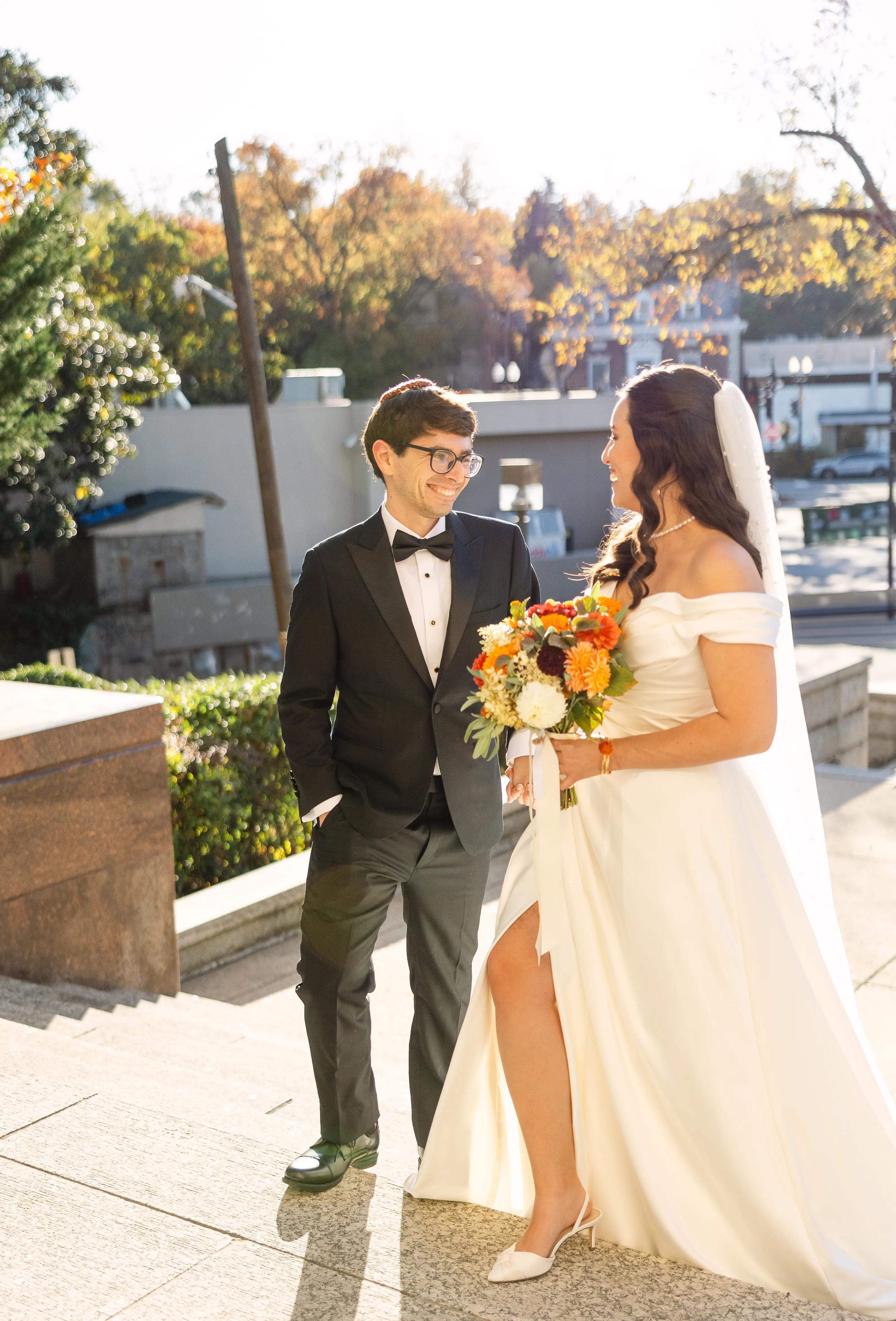 Groom Looking At Bride Wearing Satin Aline Wedding Dress Called Ekaterina By Maggie Sottero