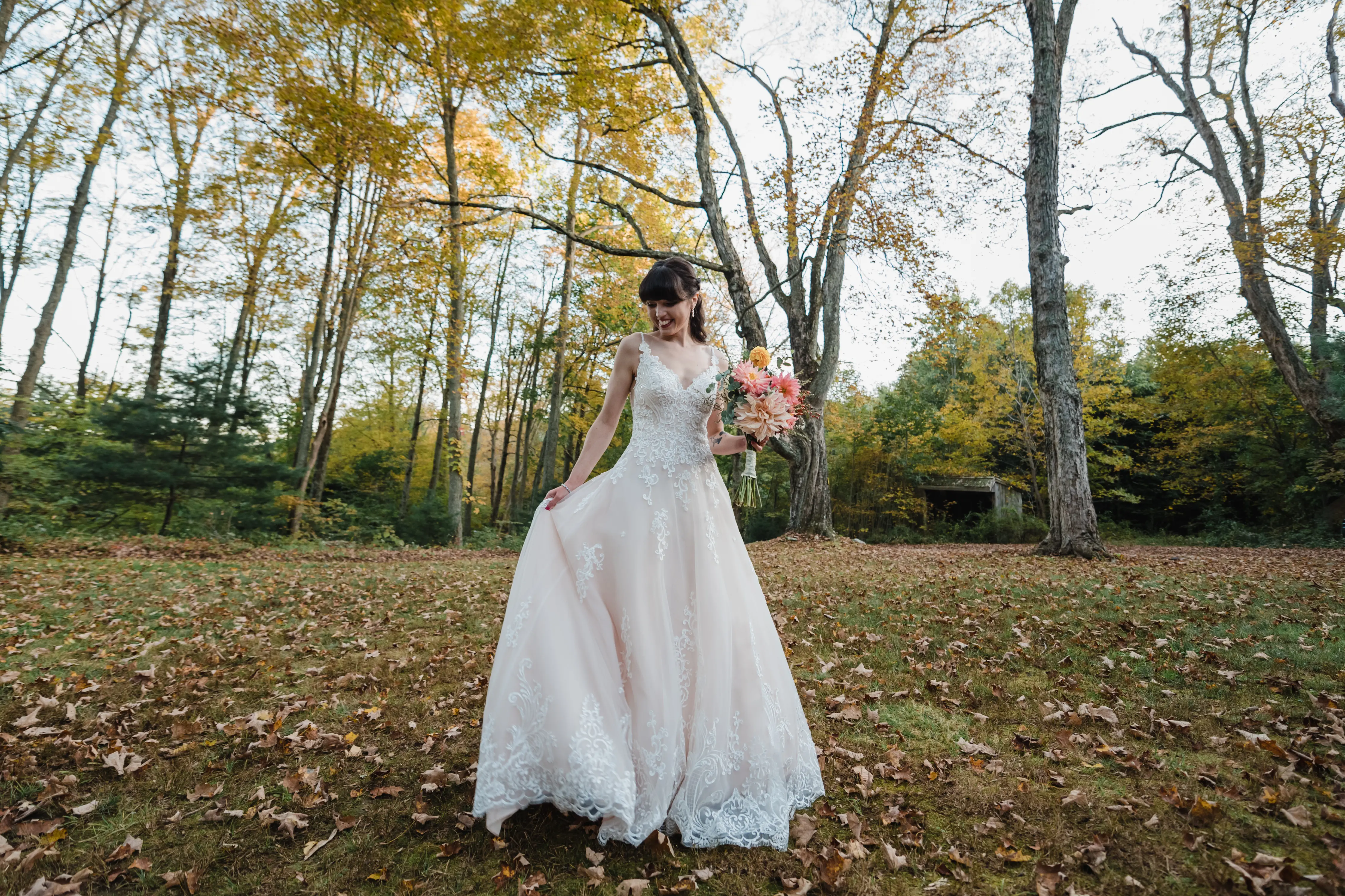Bride Wearing Lace A-Line Wedding Dress Called Wallis By Maggie Sottero In The Forest