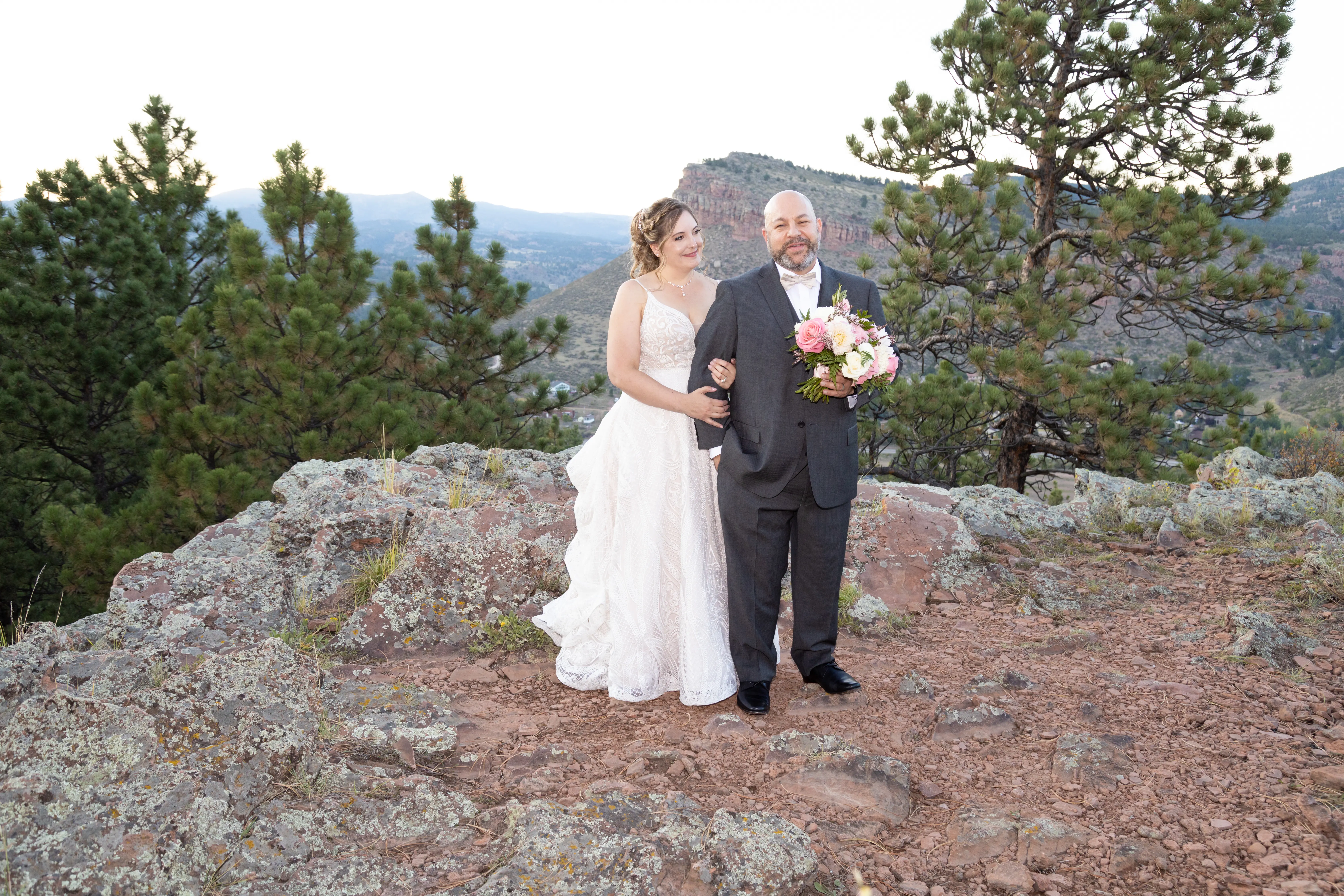 Groom With Bride Wearing Boho Princess A-Line Wedding Dress Roxanne By Sottero And Midgley