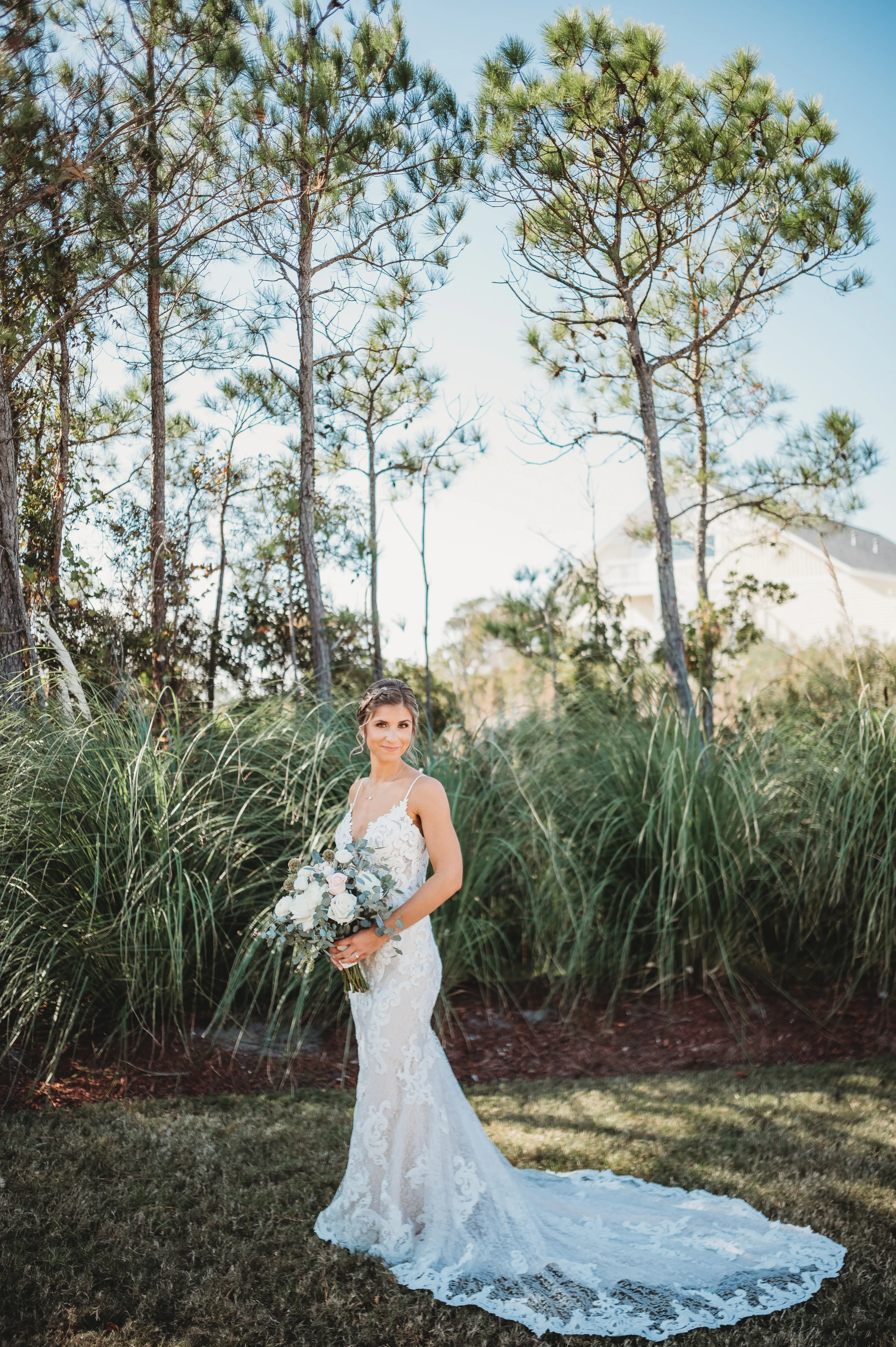 Bride in Mermaid Wedding Dress with Shimmering Lace Motifs and Illusion Plunging Sweetheart Neckline Called Tuscany by Maggie Sottero
