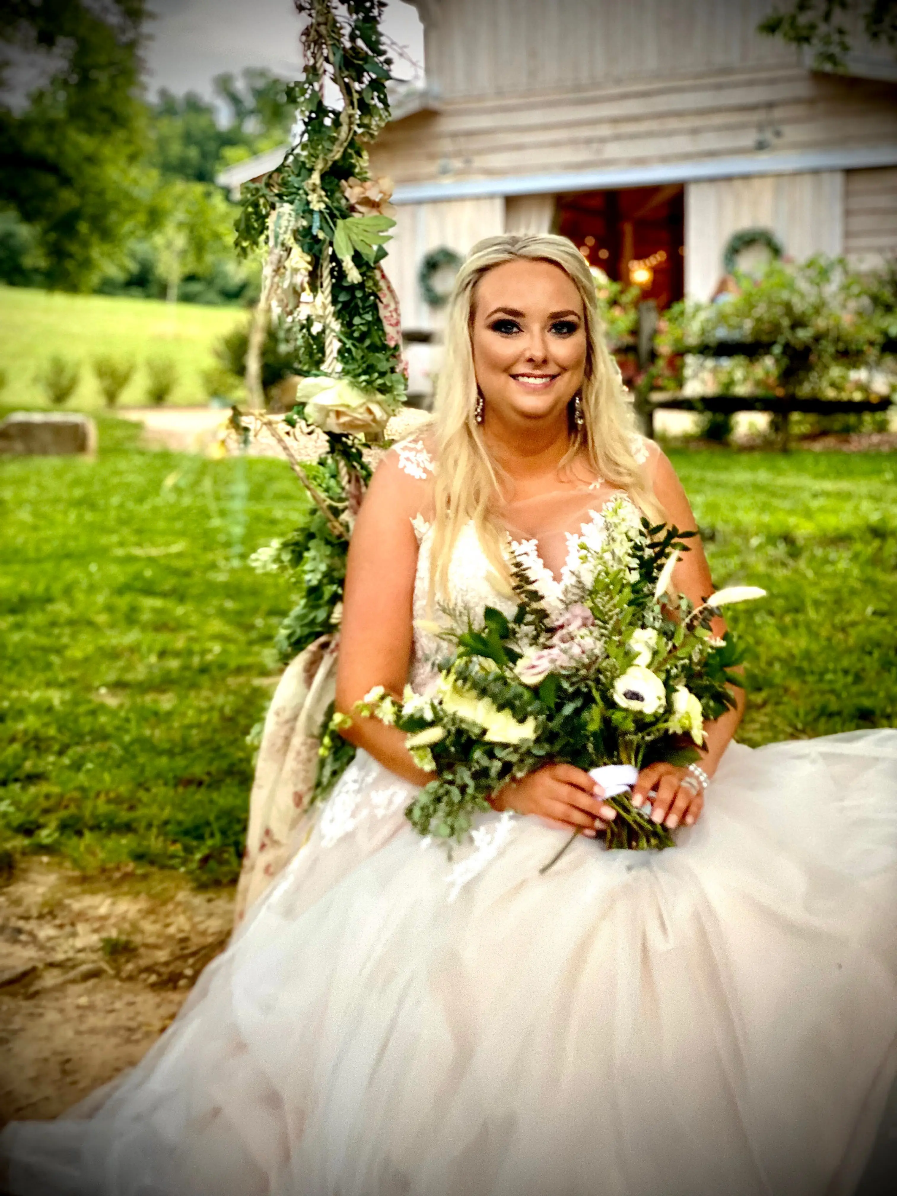 Bride at an Outdoor Wedding Wearing Lace Ballgown Wedding Dress Called Olivia by Rebecca Ingram