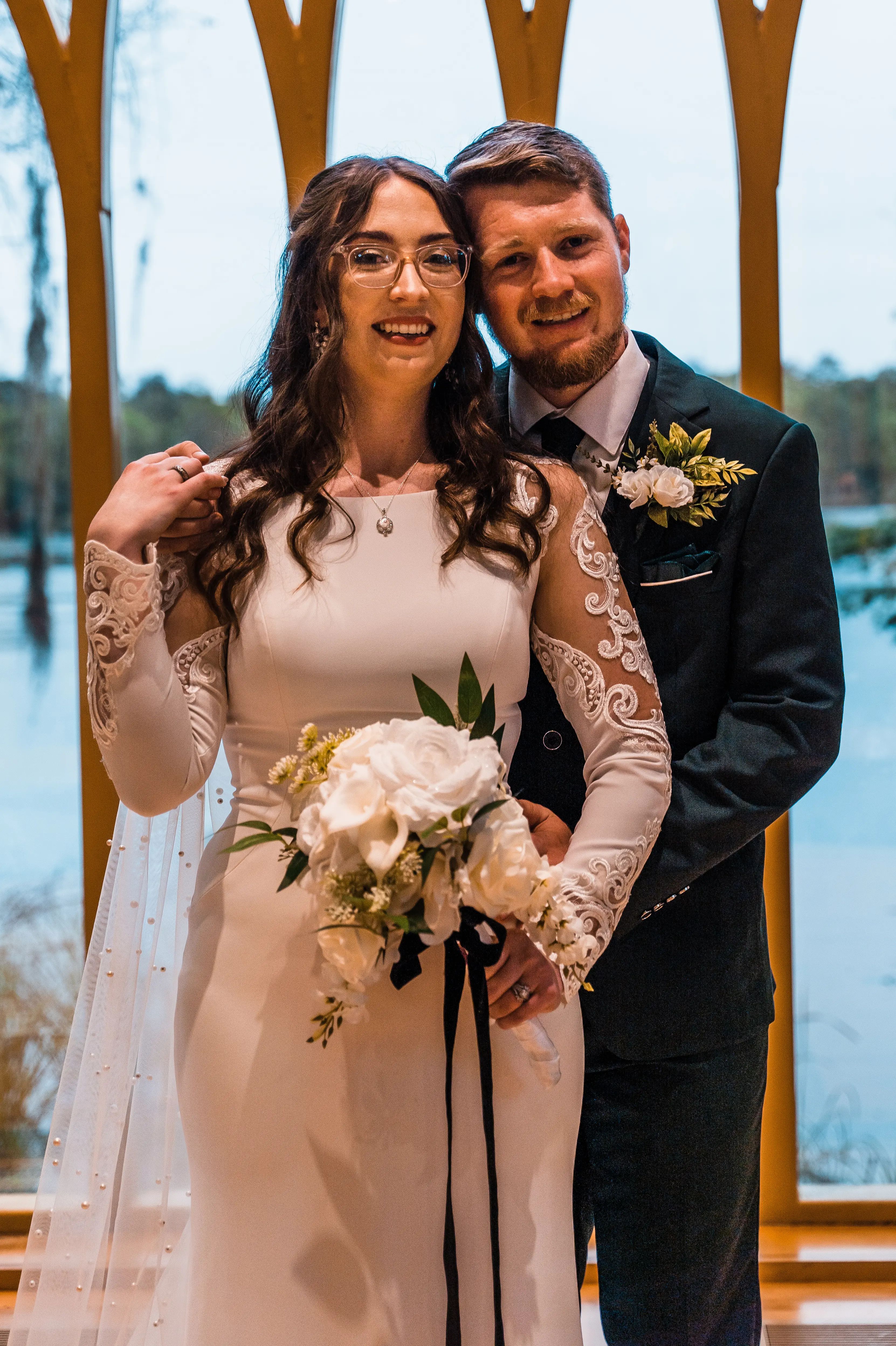 Bride Wearing Simple Long Sleeve Wedding Dress Called Bethany By Rebecca Ingram With Groom