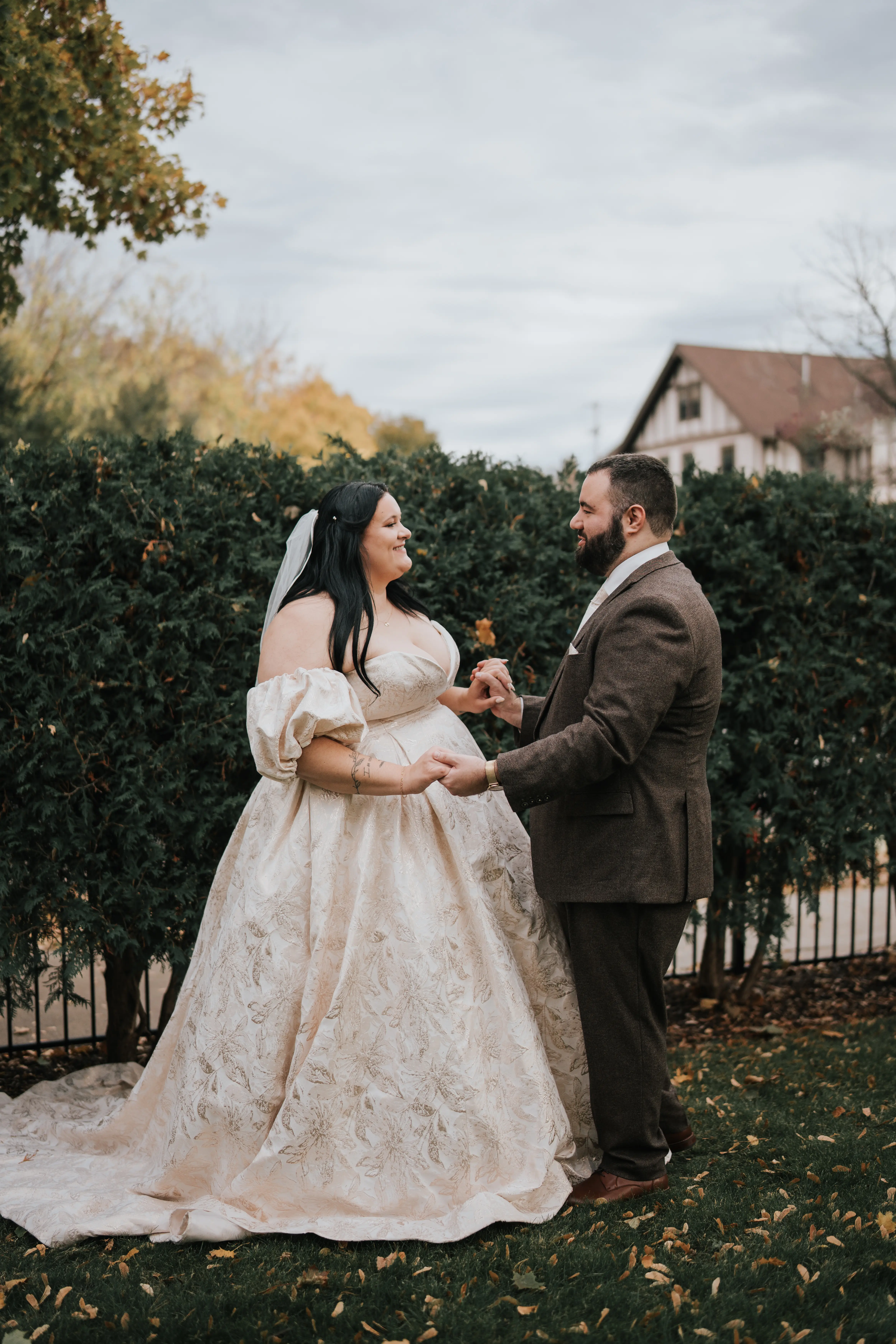 Bride Wearing Floral Jacquard Princess Wedding Gown Called Cyprus By Sottero And Midgley Looking At Groom