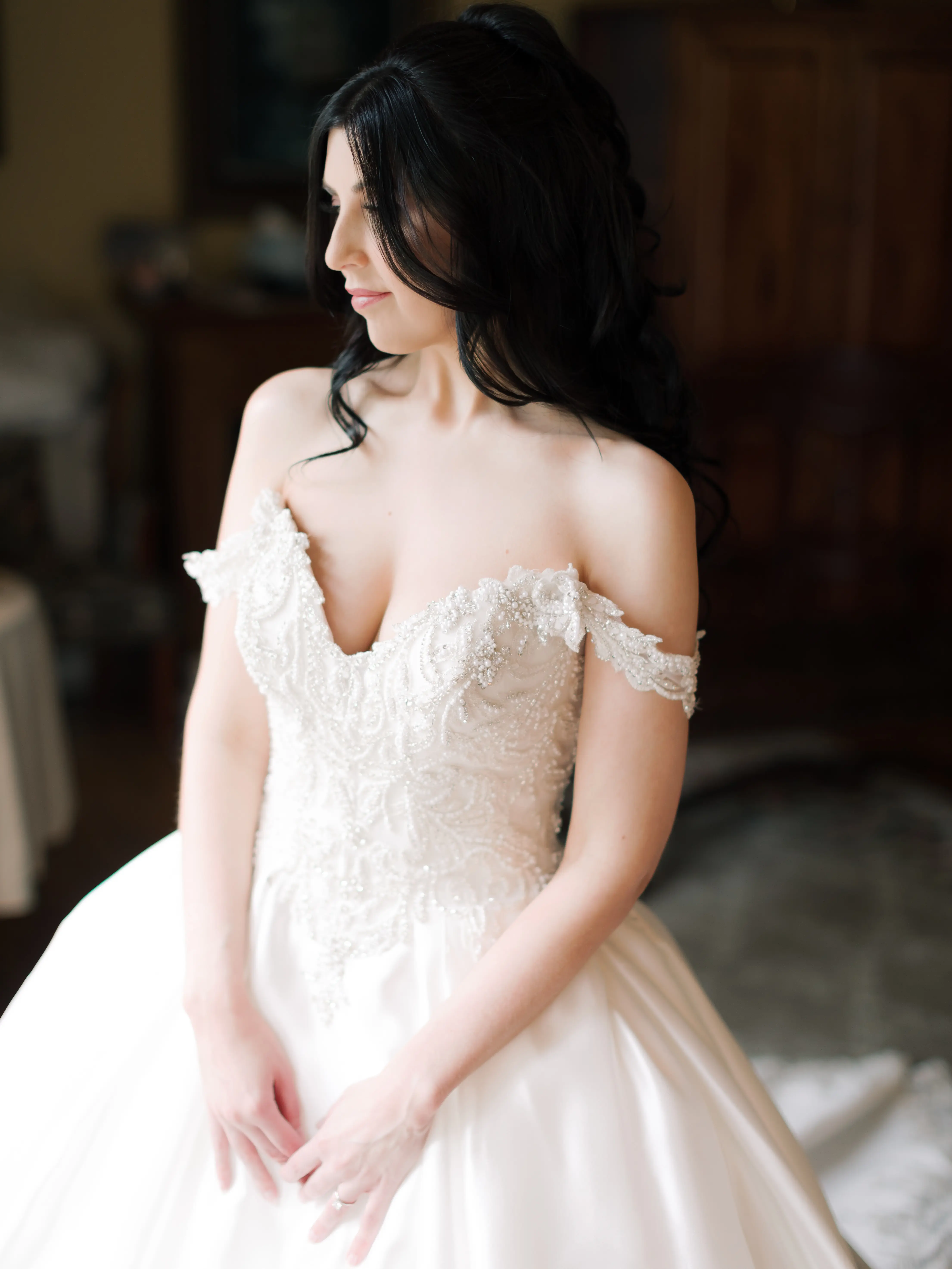 Bride wearing off the shoulder luxury ballgown wedding dress