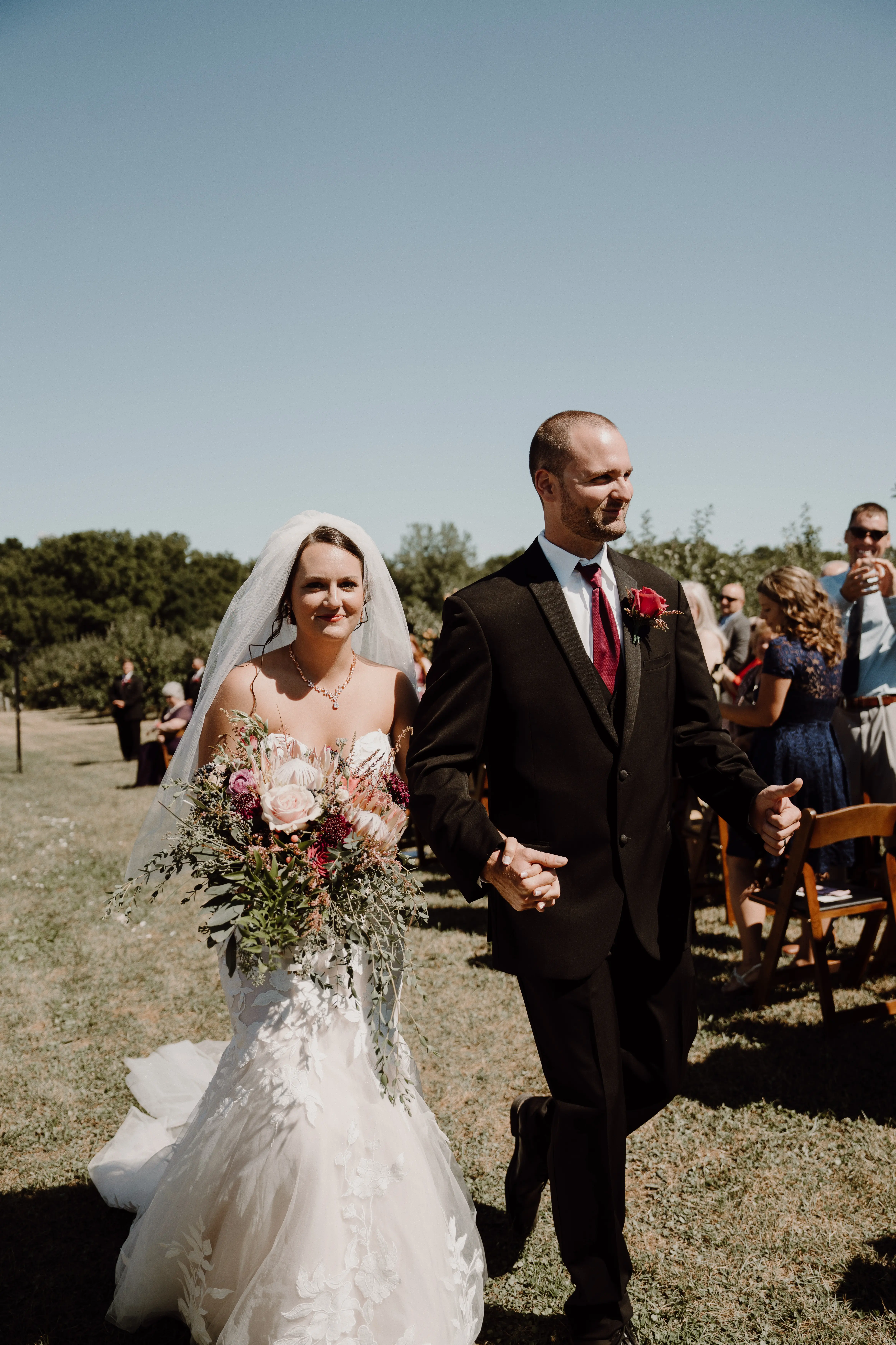 Groom With Bride Wearing Mermaid Wedding Dress With Oversized Lace Hattie By Rebecca Ingram