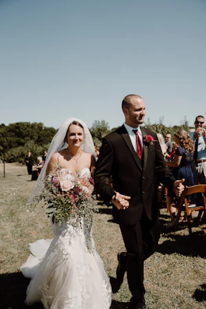 Groom With Bride Wearing Mermaid Wedding Dress With Oversized Lace Hattie By Rebecca Ingram
