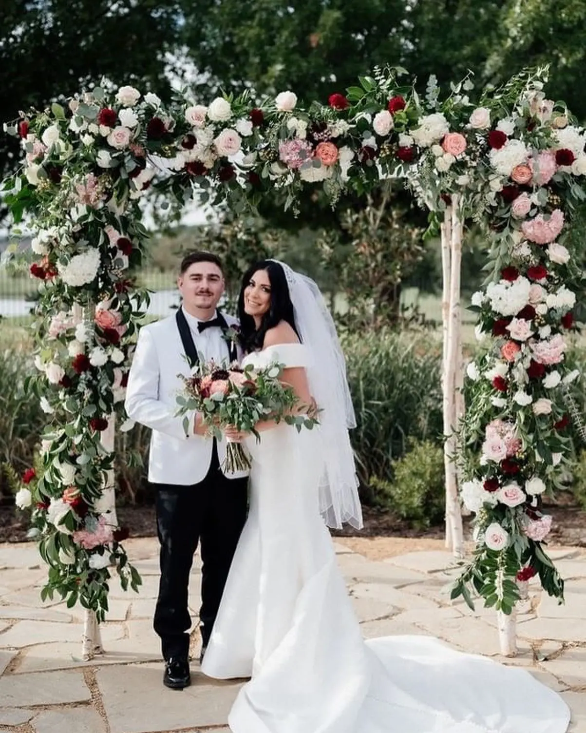Groom With Bride Wearing Off-The-Shoulder Wedding Dress Josie By Rebecca Ingram