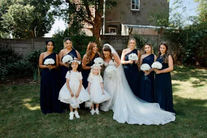 Bride Wearing Boho Lace Wedding Dress Called Roxanne By Sottero And Midgley With Her Bridesmaids And Flowergirls