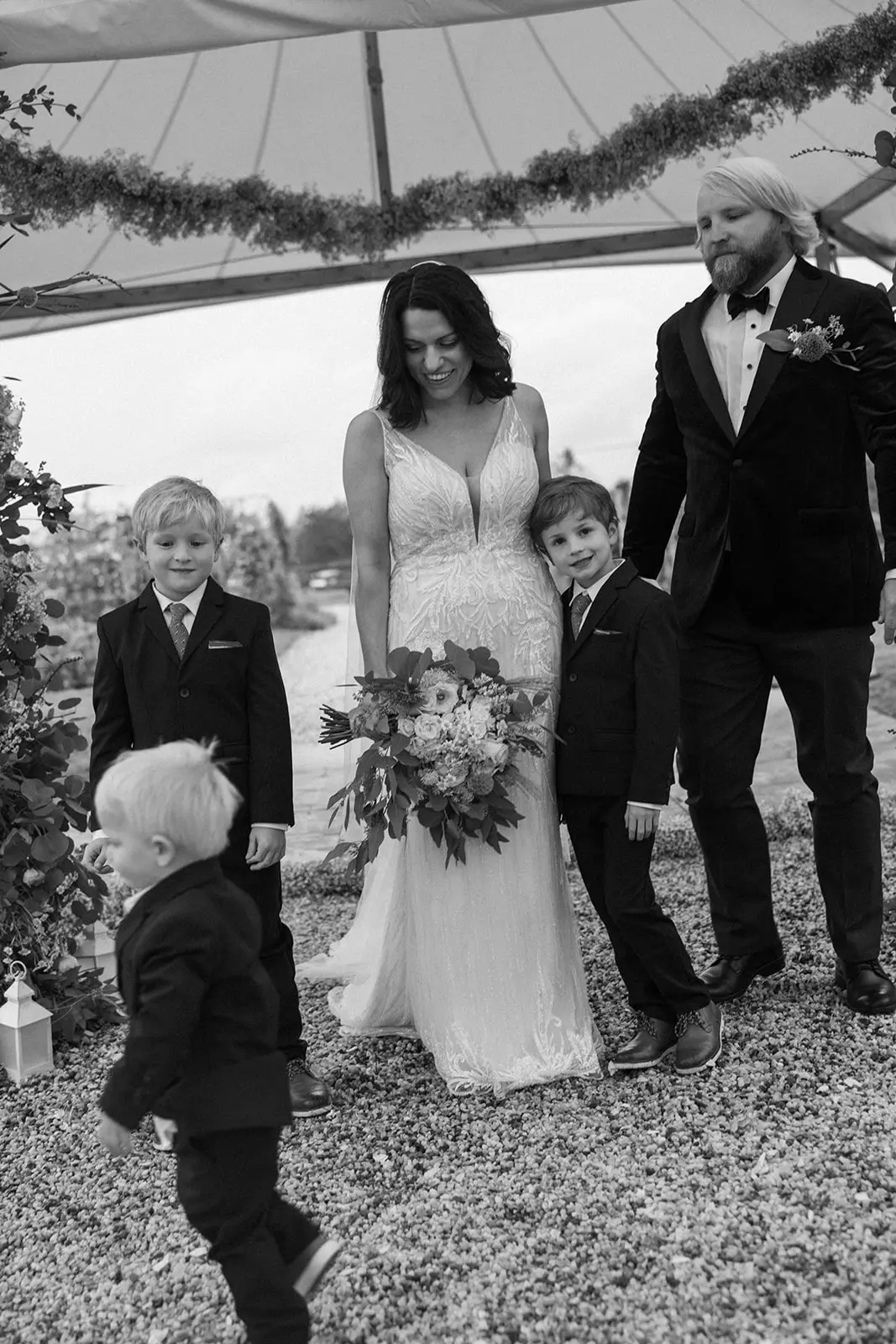 Bride wearing Luella wedding dress by Sottero and Midgley with her family