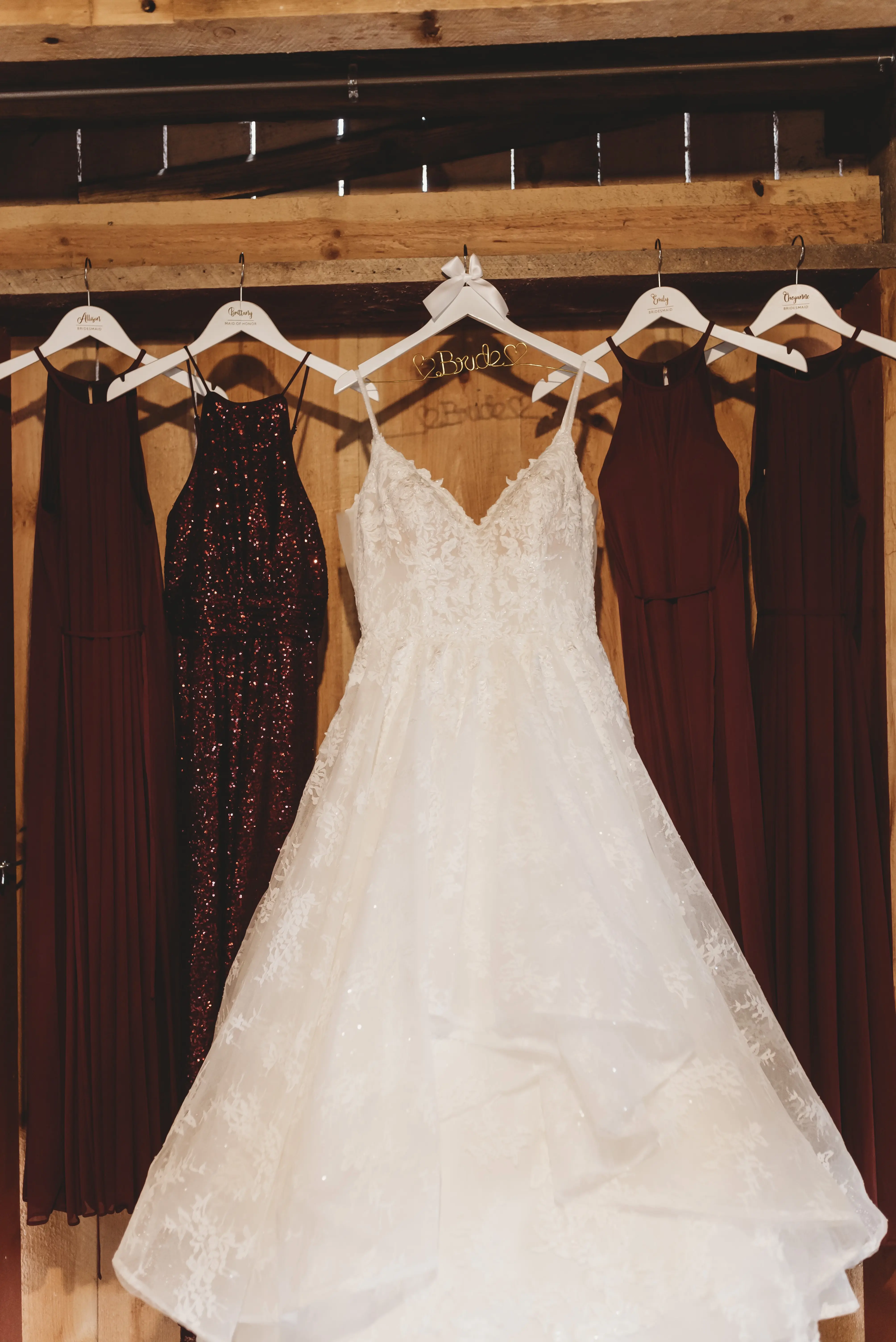 Bride In Lace Ruffled Wedding Dress Called Yuri By Maggie Sottero With Bridesmaids In Maroon