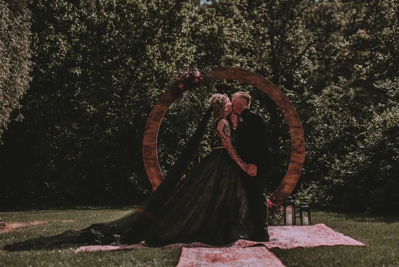 Groom With Bride Wearing Black Lace Ball Gown Zander By Sottero and Midgley