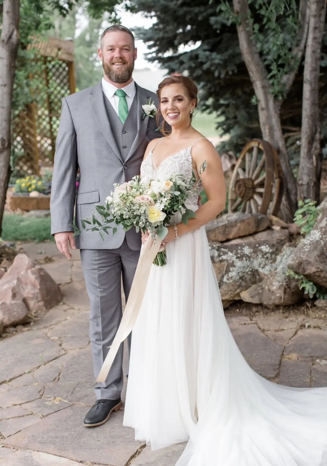 Groom With Bride Wearing Relaxed A-Line Wedding Dress Called Charlene By Maggie Sottero