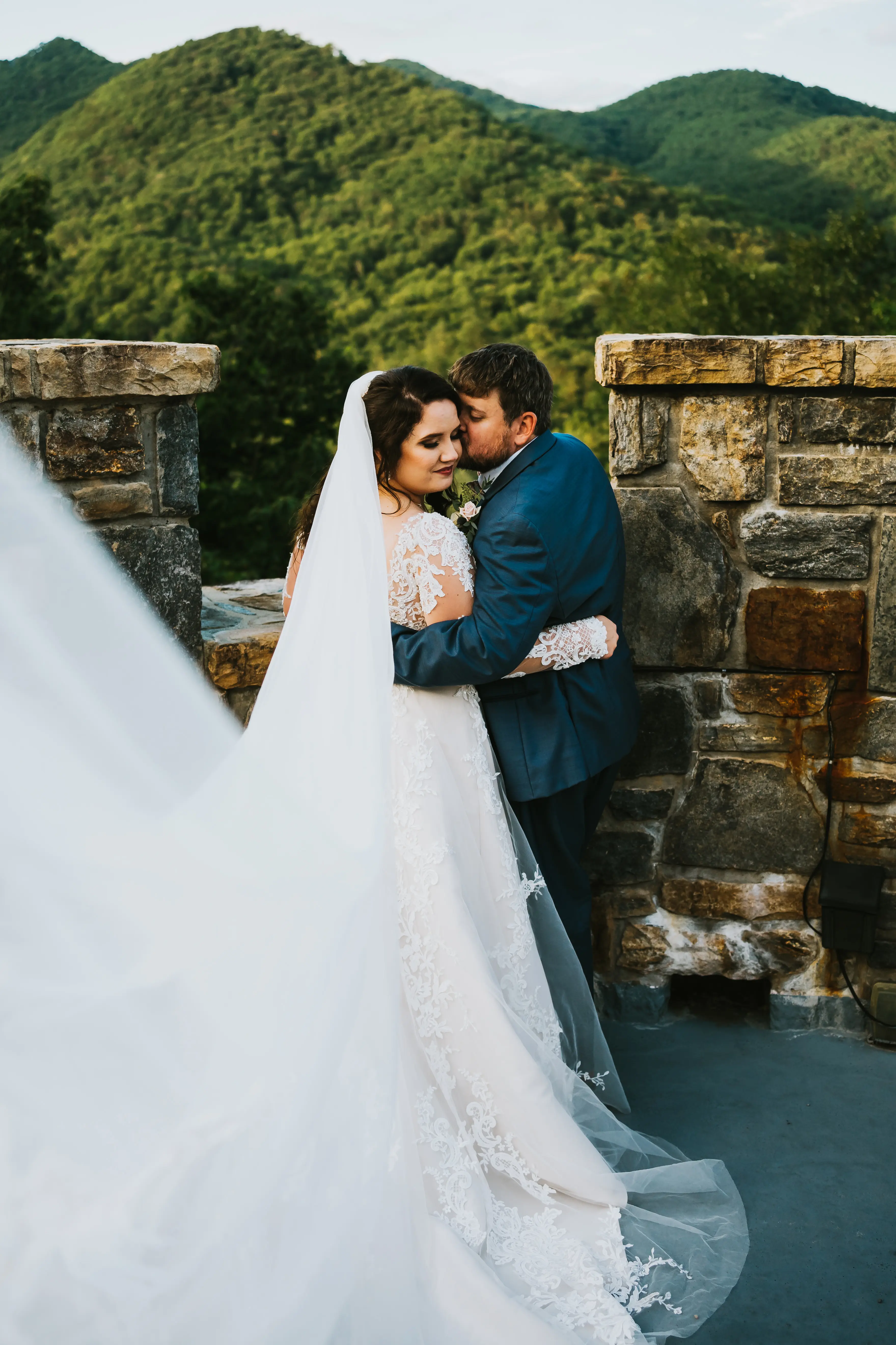 Bride Wearing Shimmery Princess Bridal Gown Called Tiffany By Maggie Sottero With Long Elegant Veil