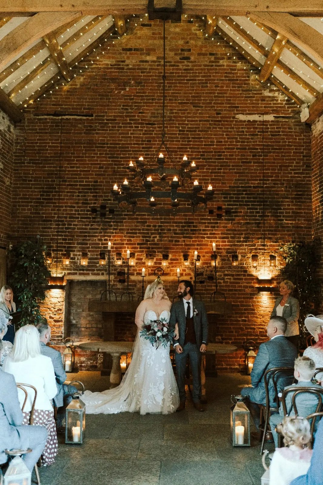 Bride Wearing Lace Mermaid Wedding Dress Called Hattie By Rebecca Ingram With Groom At The Ceremony