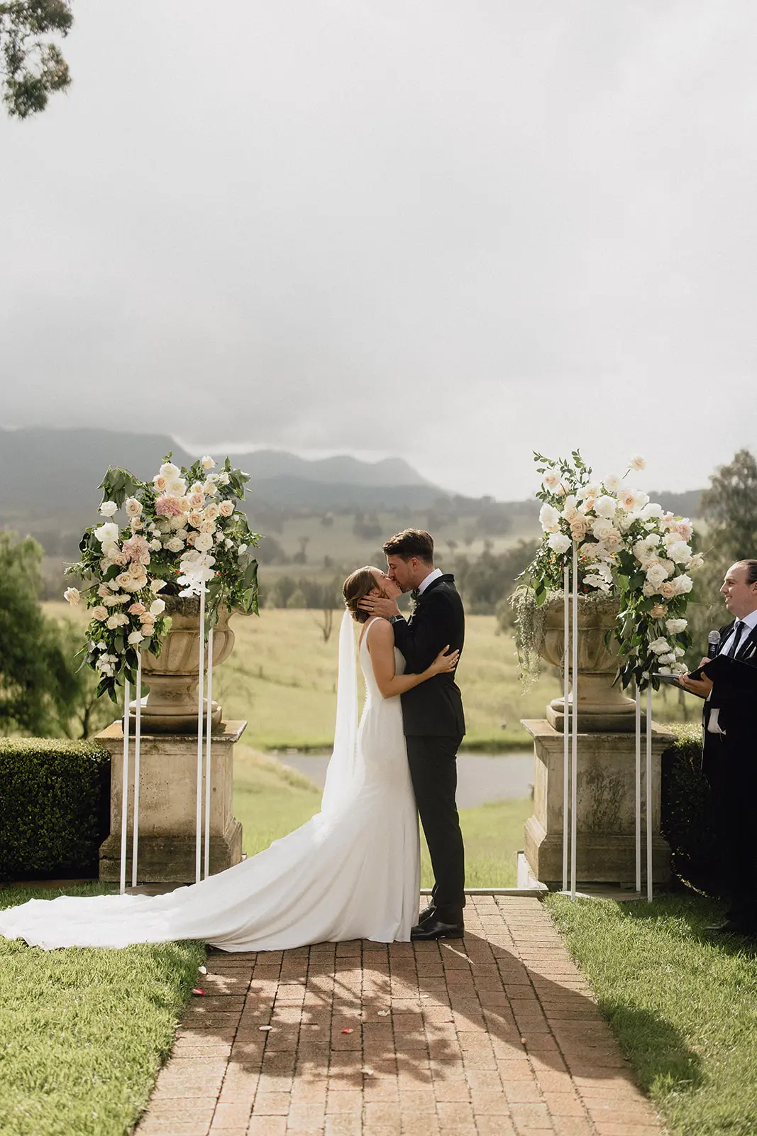 Groom With Bride Wearing Minimalist Crepe Fit-And-Flare Wedding Dress Fernanda By Maggie Sottero