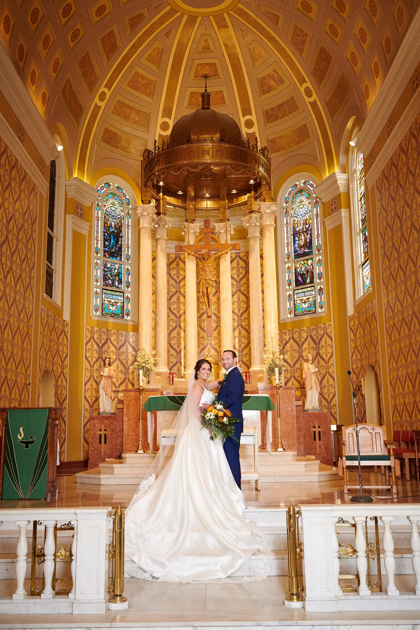 Bride Wearing Simple A-Line Bridal Gown Called Selena By Maggie Sottero In A Church With The Groom