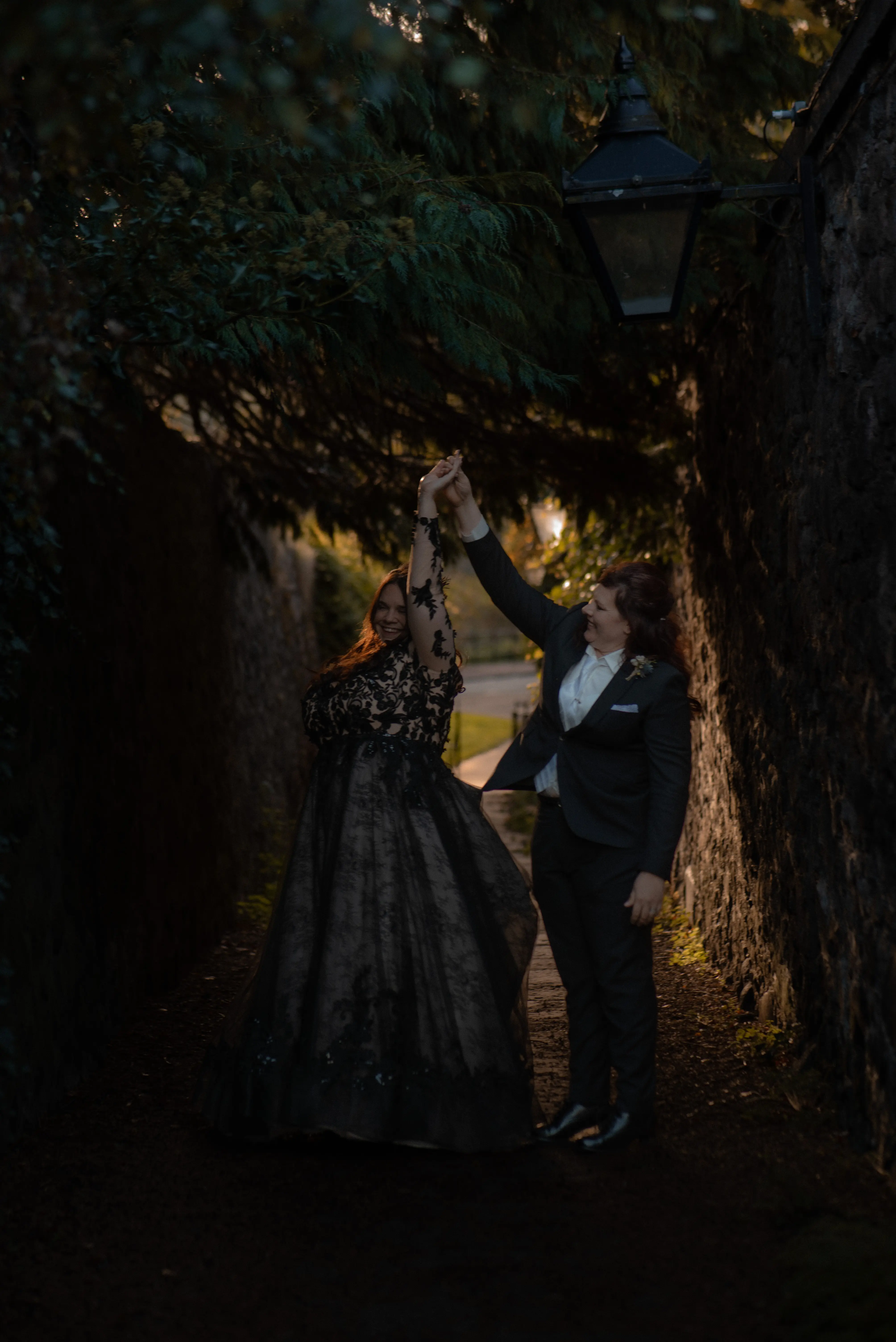Bride Wearing Black A-Line Wedding Dress Called Zander By Sottero And Midgley Dancing With Bride