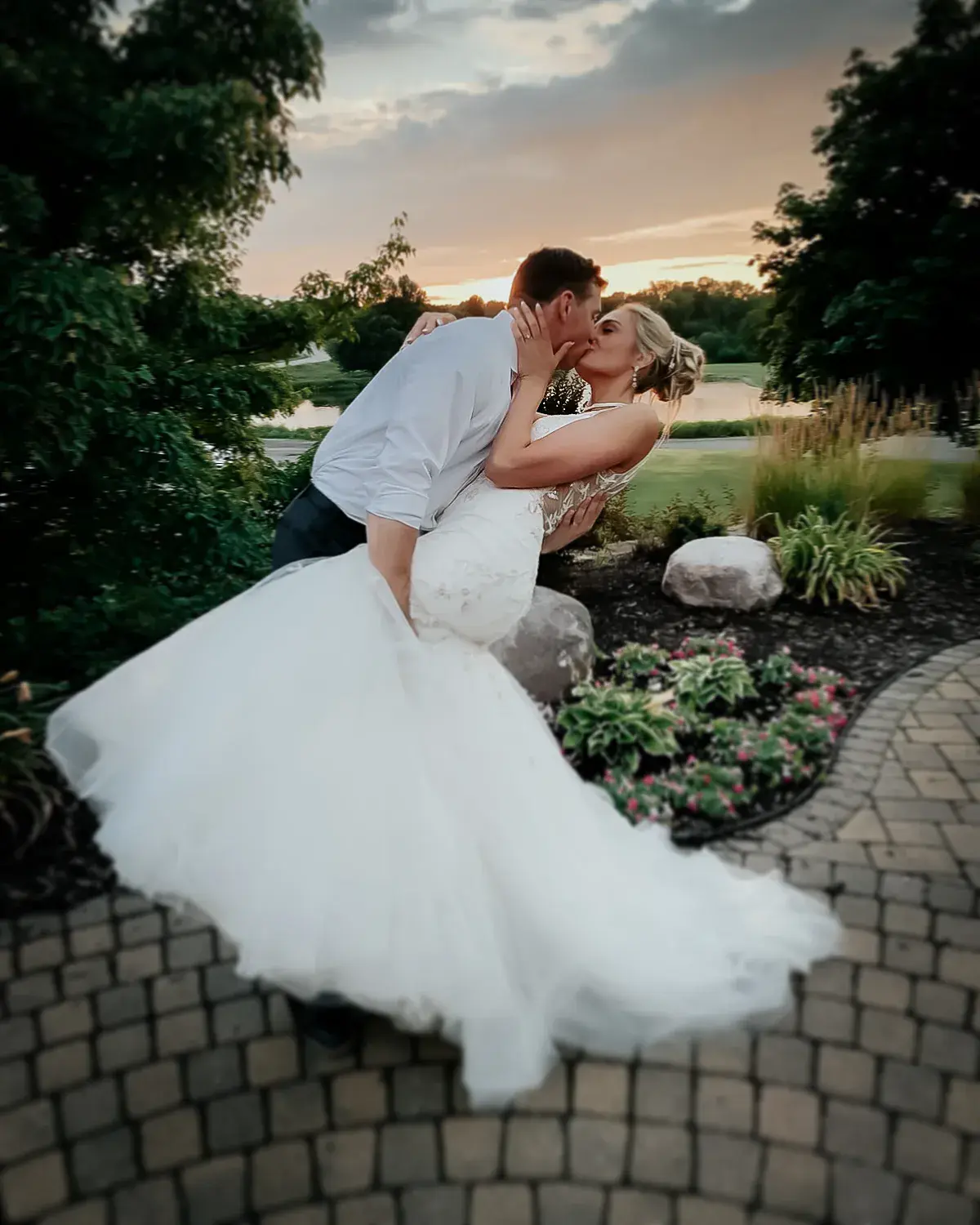 Groom With Bride Wearing Trumpet Wedding Dress With Colorful Floral Lace Motifs Kenleigh By Sottero And Midgley