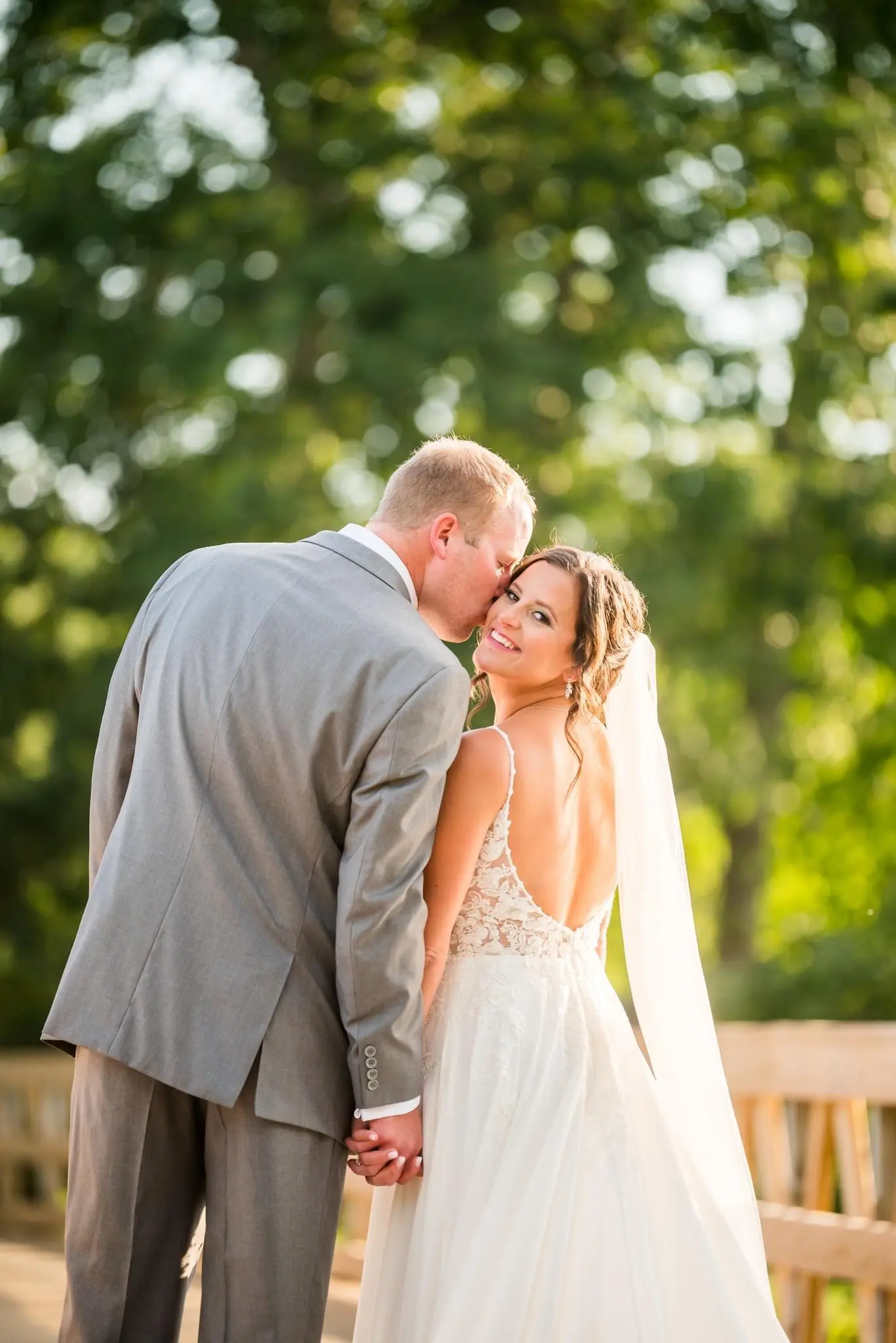 Groom With Bride Wearing Chiffon Wedding Dress With Flirty Lace Primrose By Maggie Sottero