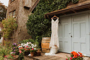 Greenley wedding dress by Maggie Sottero hanging up outside