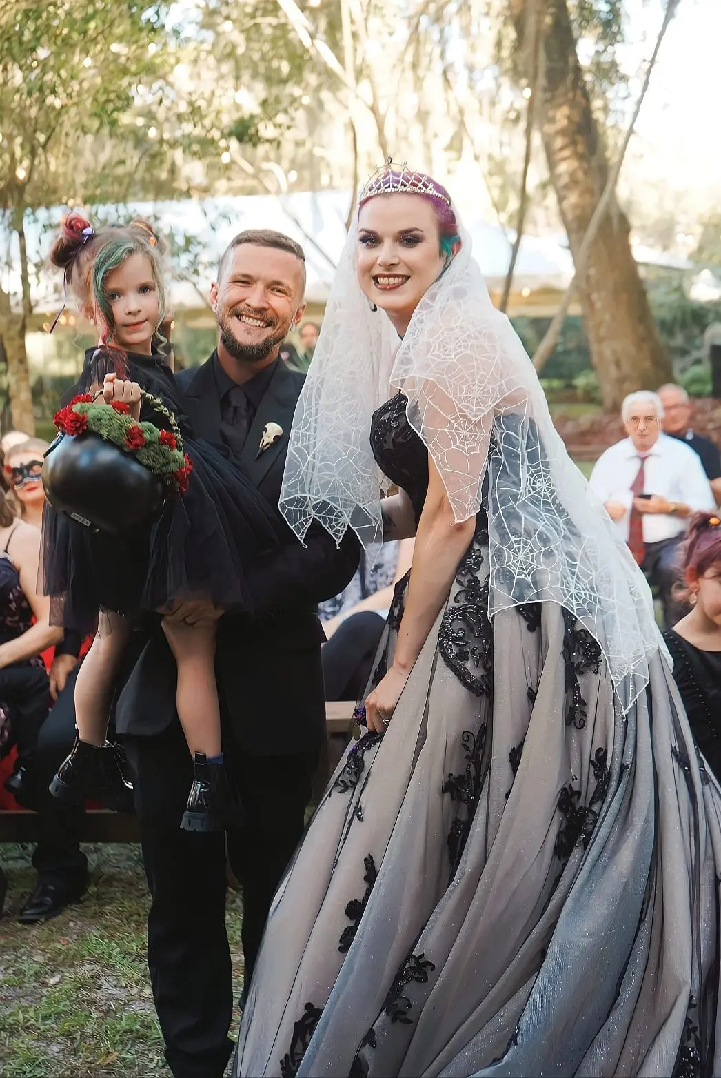 Bride Wearing Black Lace Wedding Dress Called Norvinia By Sottero and Midgley With Groom