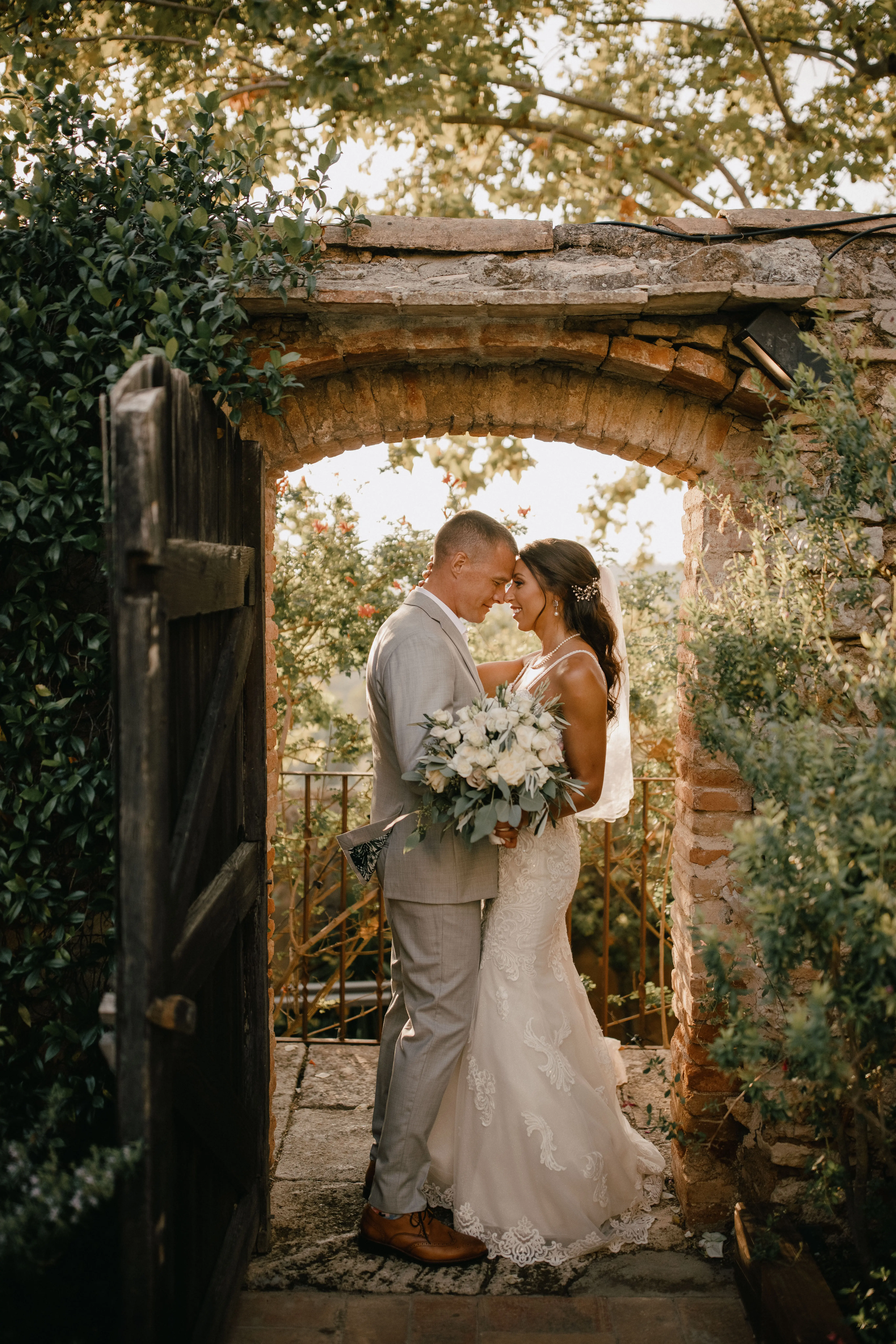 Groom with Bride in Sparkly Lace Fit-and-Flare Bridal Dress Called Fiona by Maggie Sottero