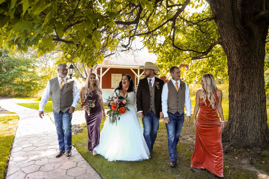Bride wearing Princess Ballgown Wedding Dress called Mallory Dawn by Maggie Sottero and the bridal party