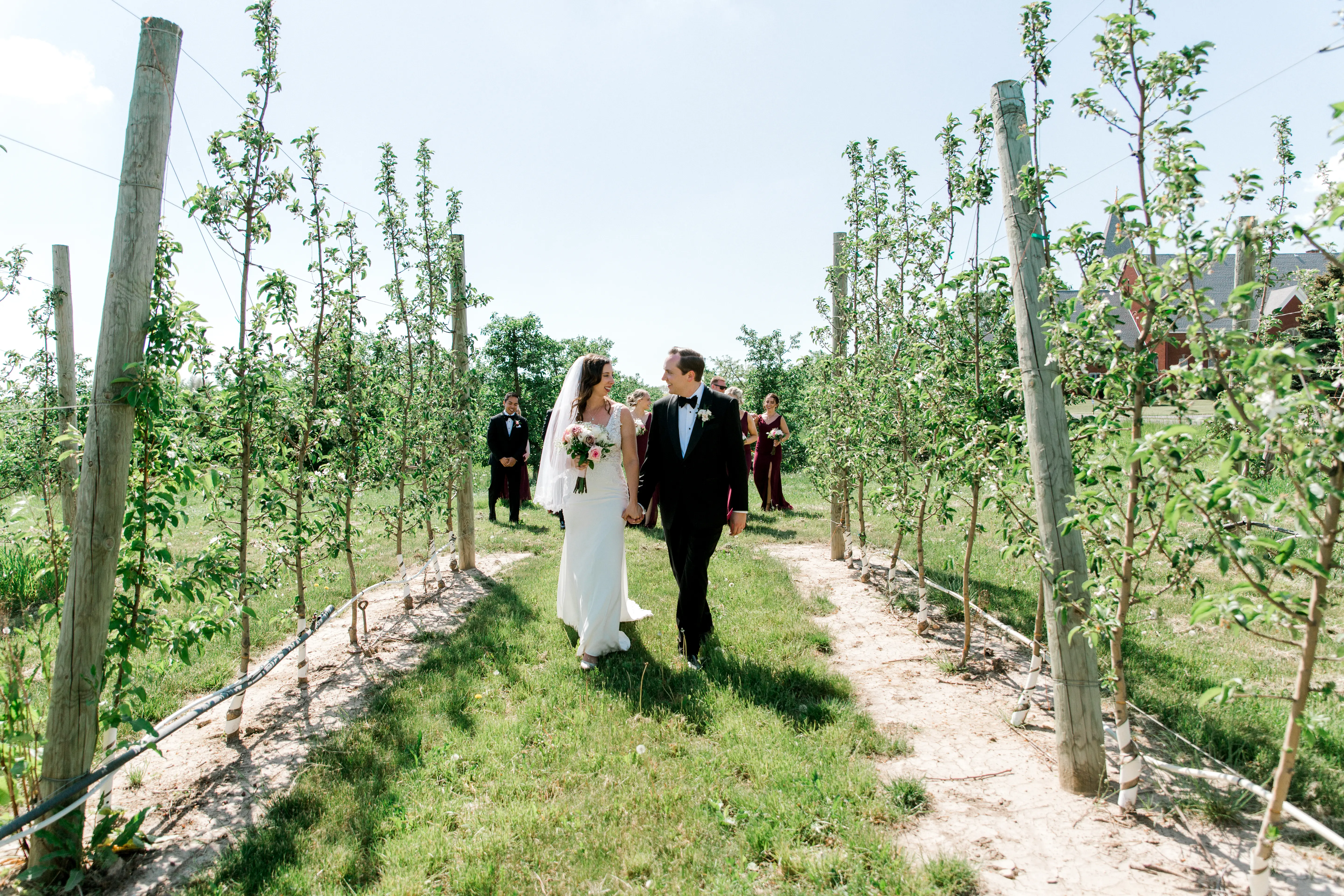 bride with groom in sexy sheath wedding dress