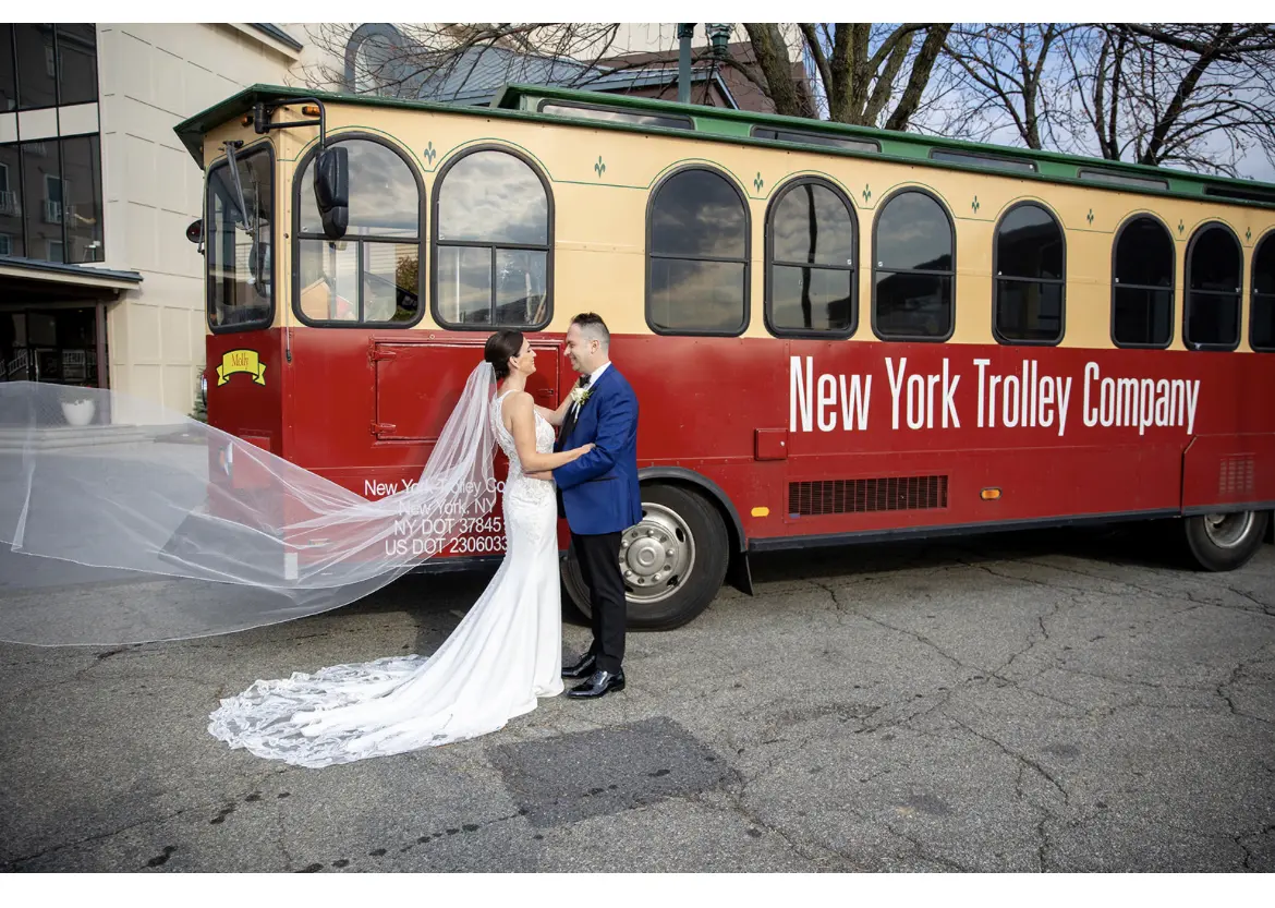 Groom With Bride Wearing Halter Style Crepe Wedding Dress Audrina By Maggie Sottero