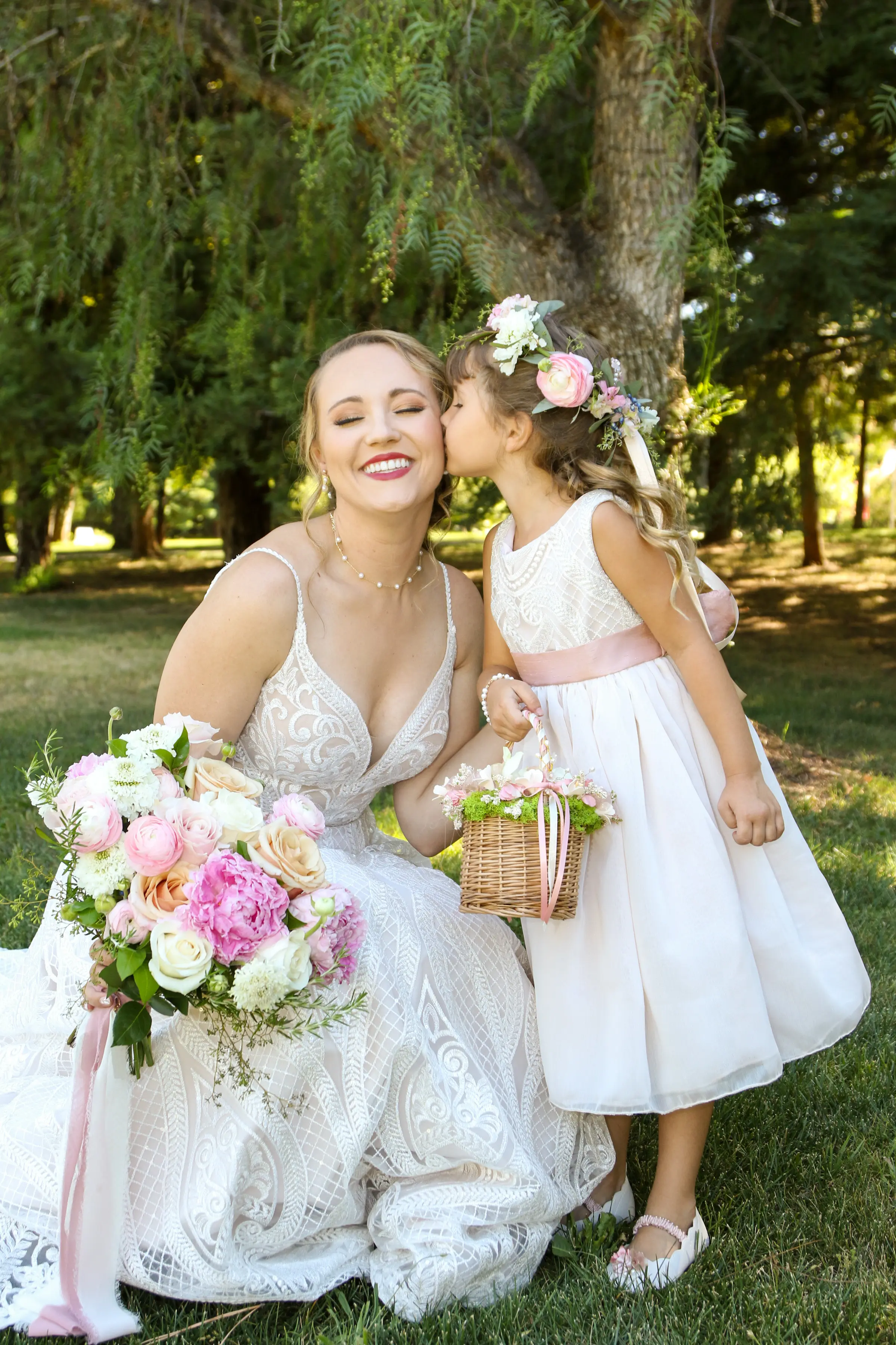 bride in classic sequin  wedding dress called roxanne by sottero and midgley with flower girl
