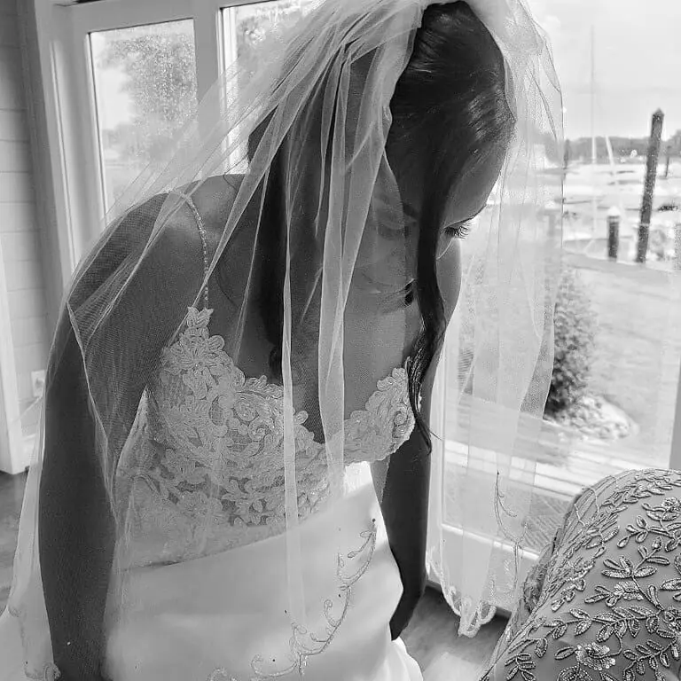 Bride Getting Ready Wearing Lace Aline Wedding Dress called Savannah by Maggie Sottero