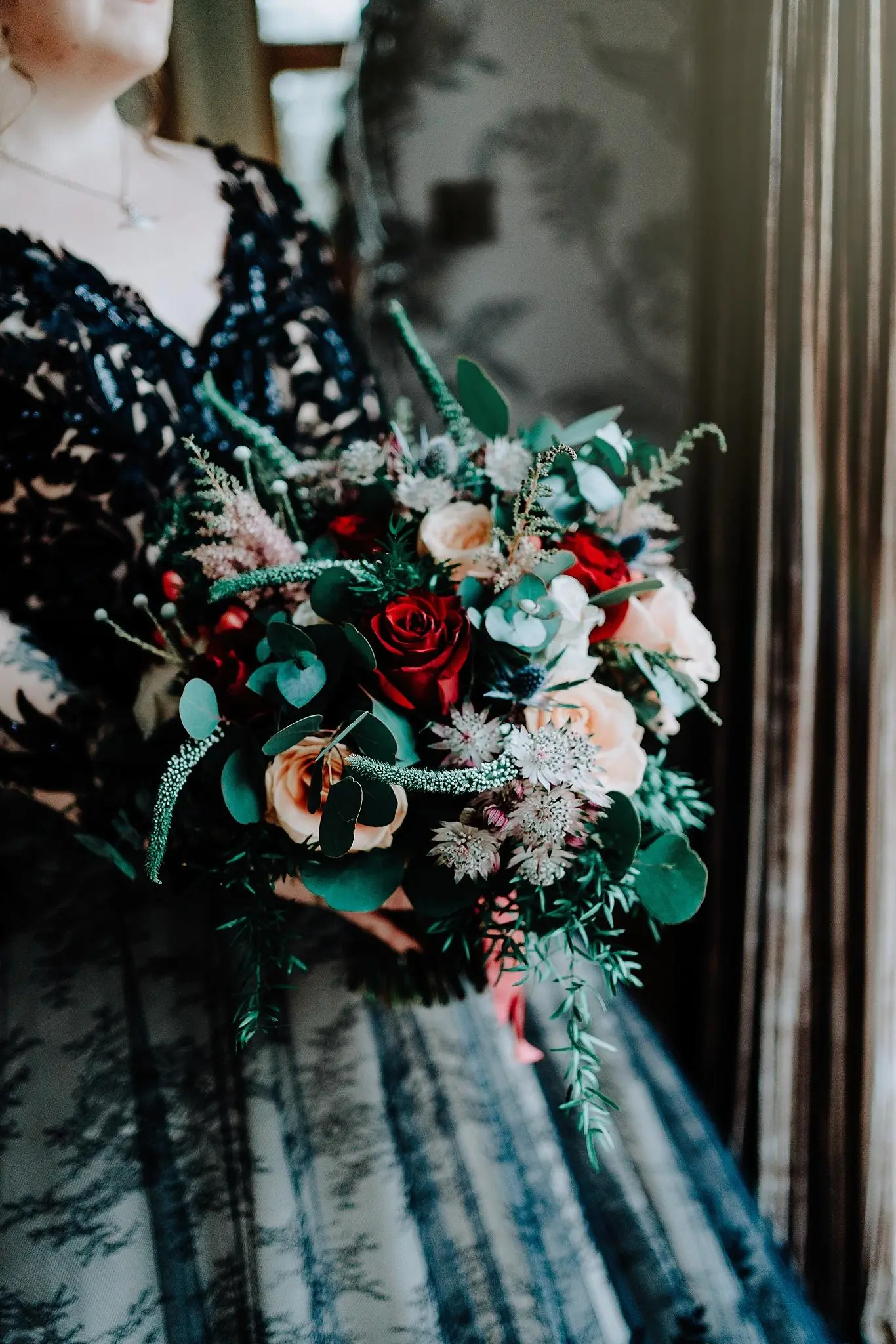 Bride Wearing Gothic Black Wedding Dress Called Zander By Maggie Sottero Holding Her Bouquet