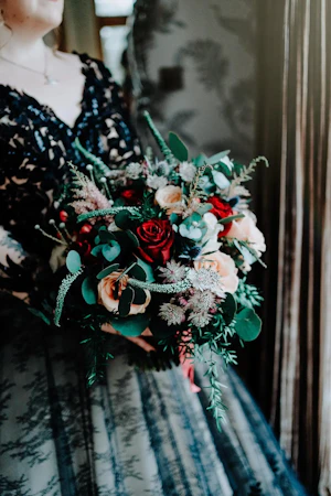 Bride Wearing Gothic Black Wedding Dress Called Zander By Maggie Sottero Holding Her Bouquet