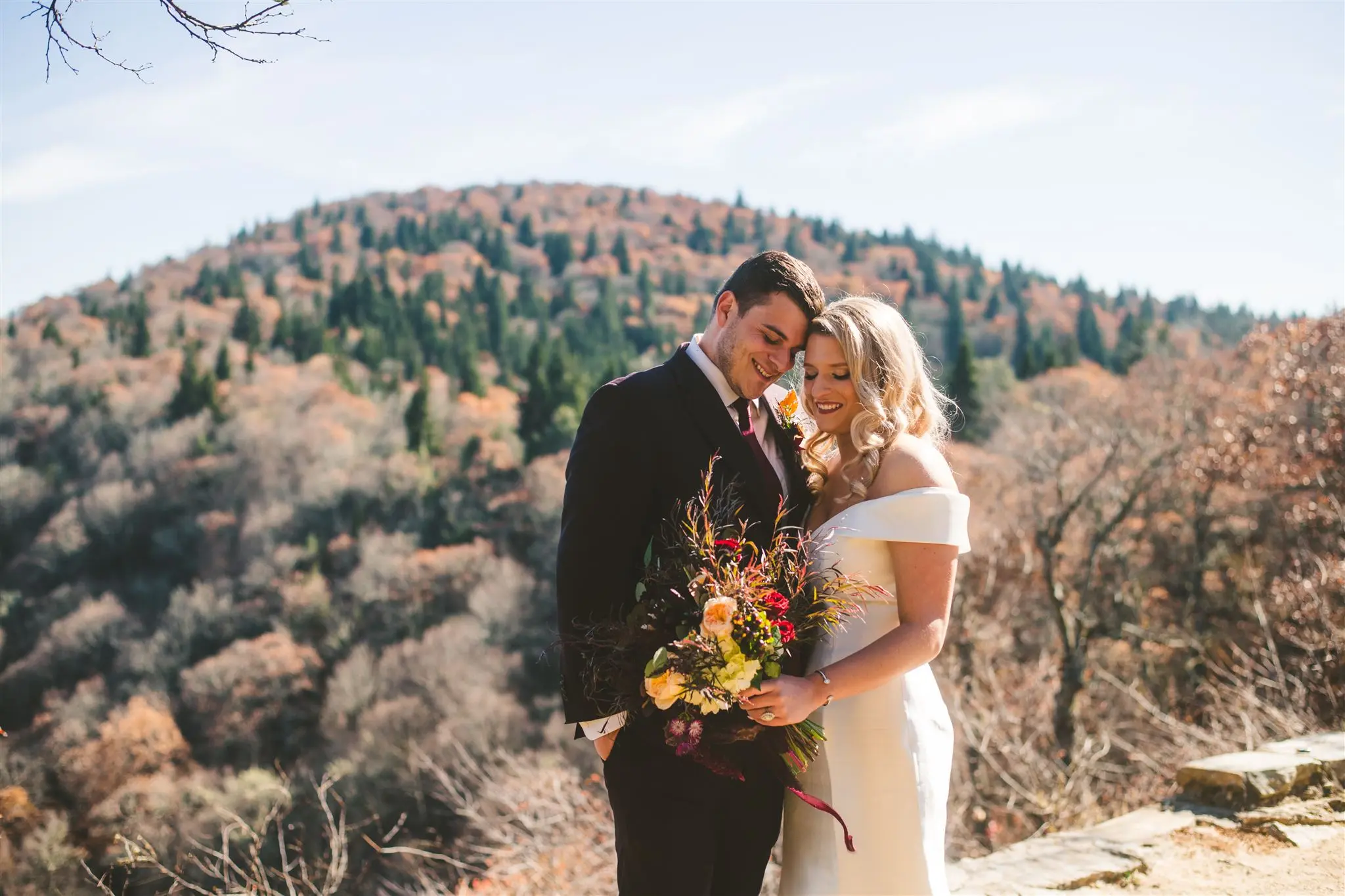 Groom With Bride Wearing Vintage Glamour Off-The-Shoulder Wedding Dress Josie By Rebecca Ingram