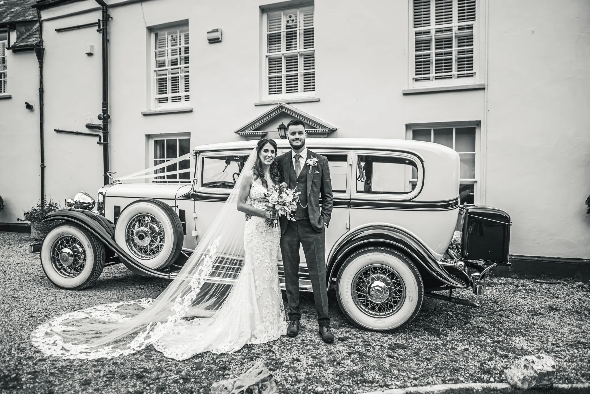 Groom With Bride Wearing Lace Sheath Wedding Dress Tuscany Lynette By Maggie Sottero