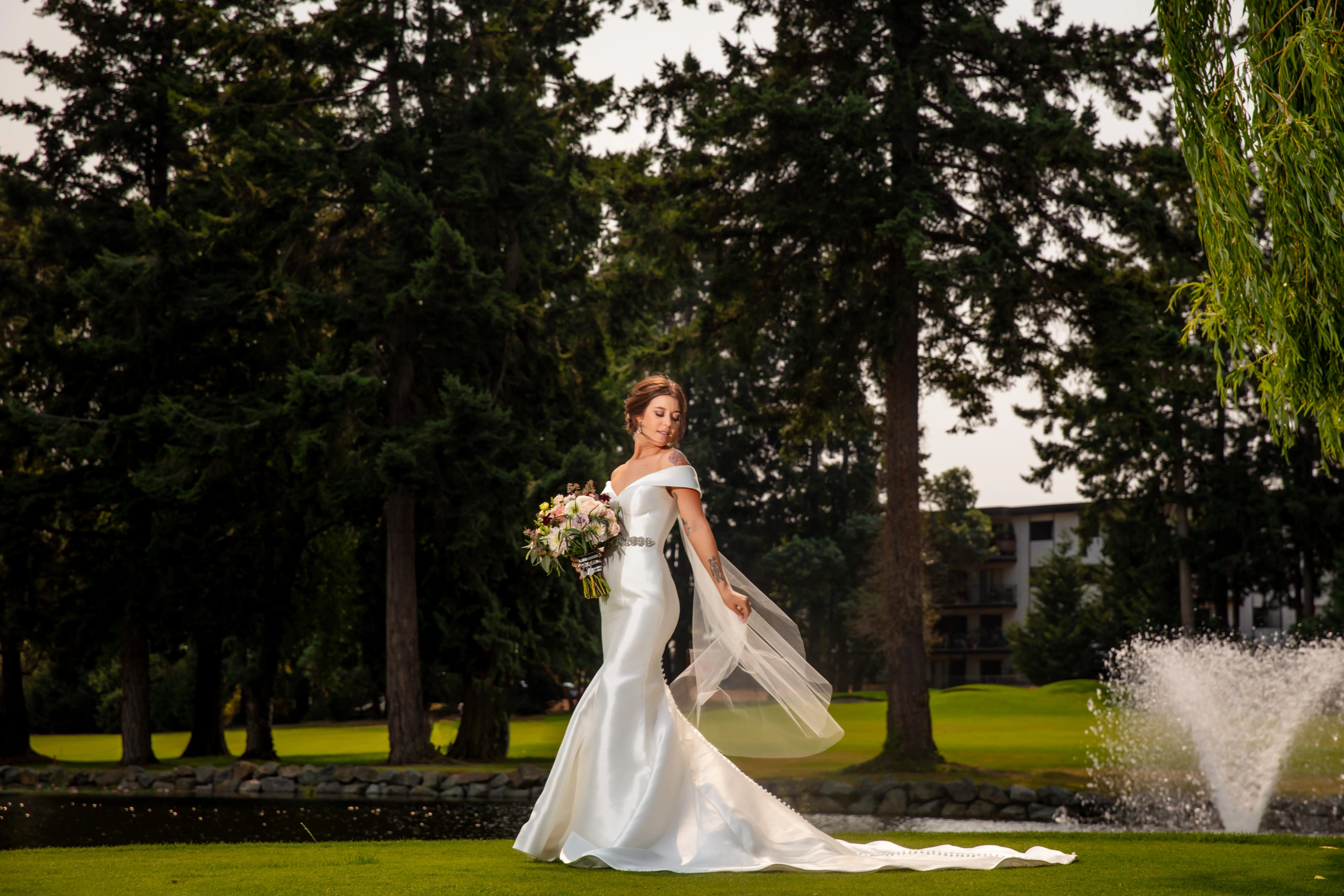 Bride Wearing Simple Classic Wedding Gown Called Josie By Rebecca Ingram