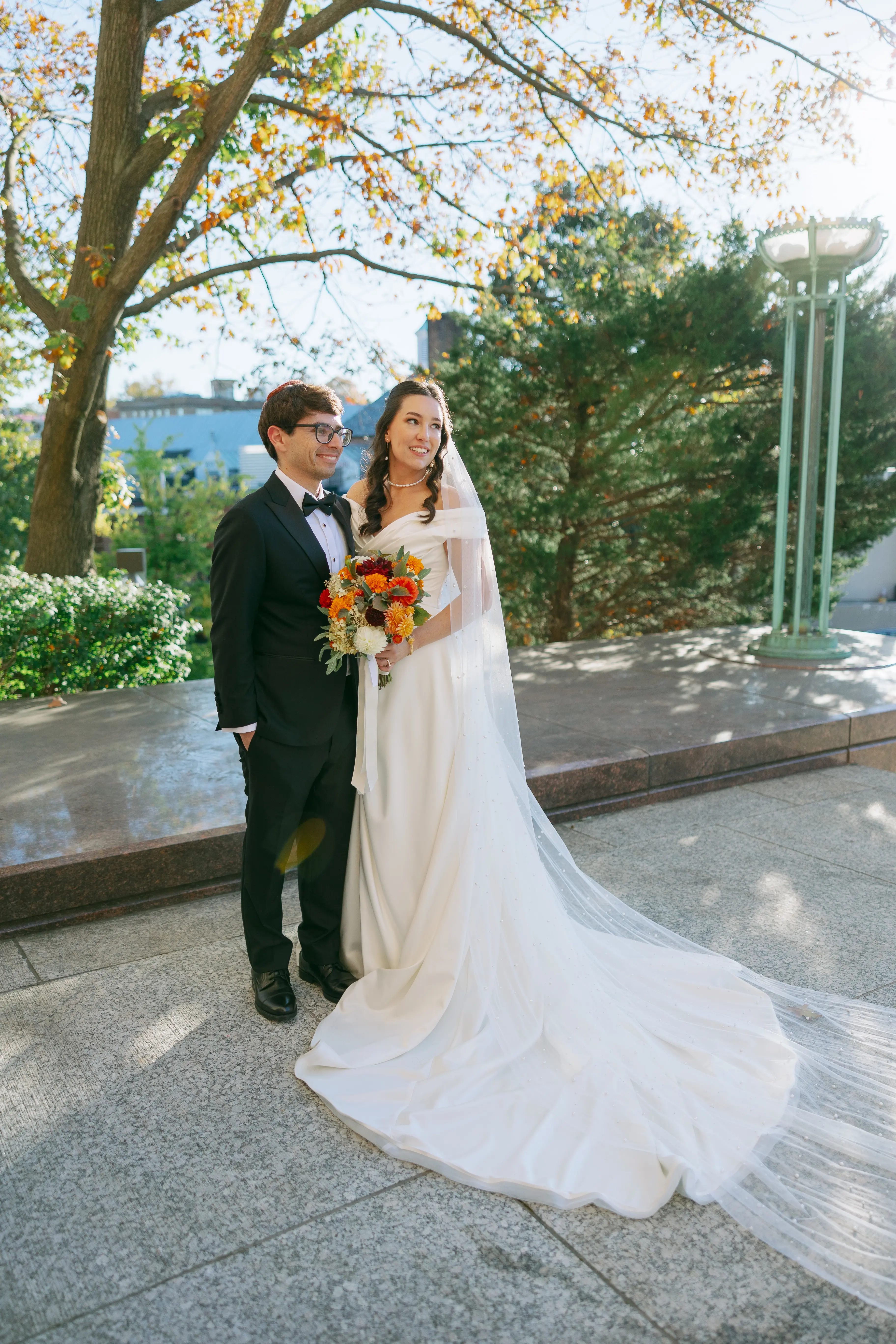 Bride Wearing Satin Aline Wedding Dress Called Ekaterina By Maggie Sottero With Groom