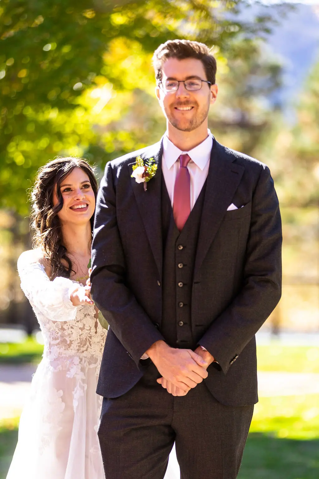 Bride with groom wearing boho A-line wedding dress