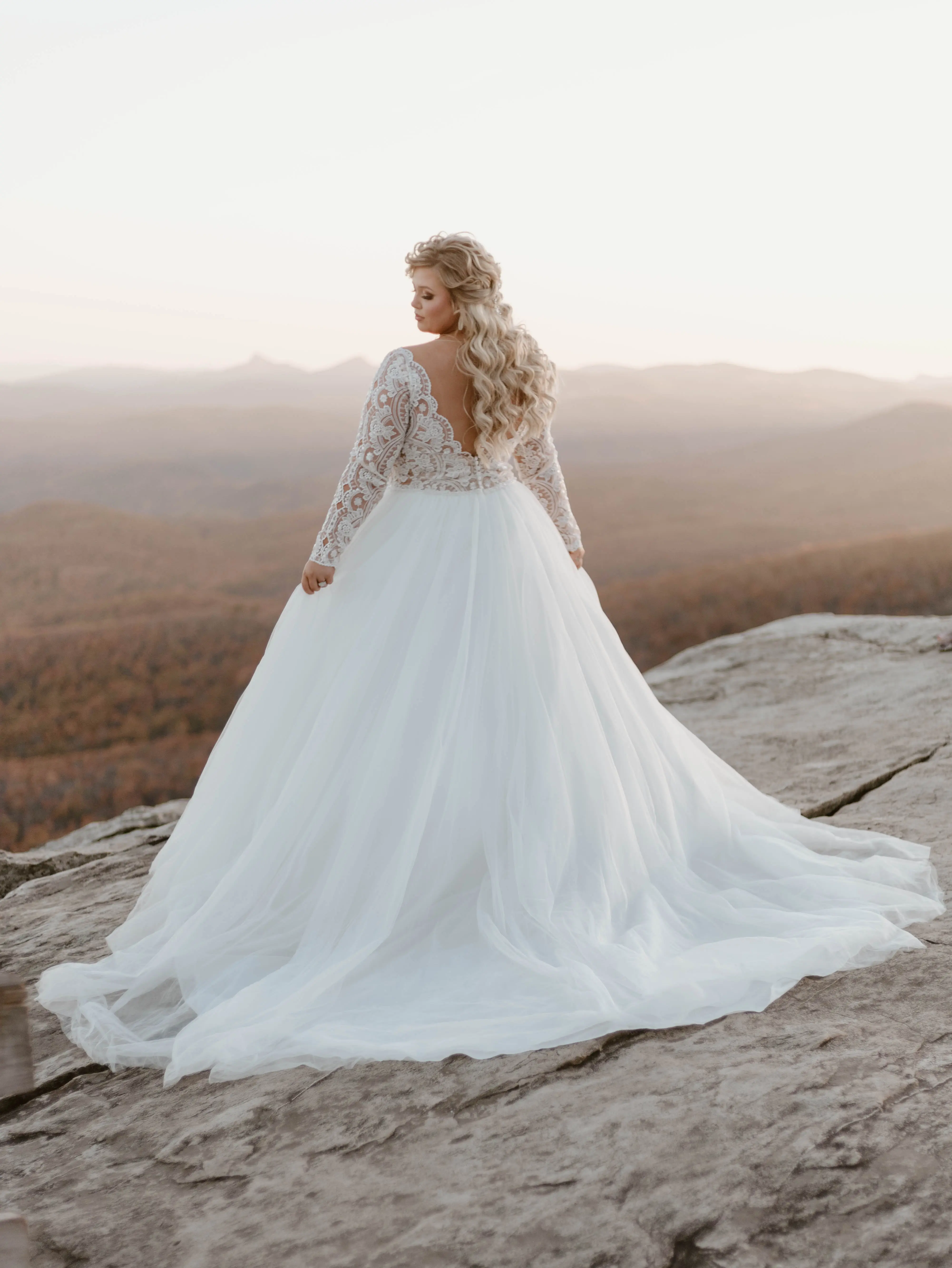 Bride In Long Sleeve Lace Ball Gown Wedding Dress Named Mallory Dawn By Maggie Sottero