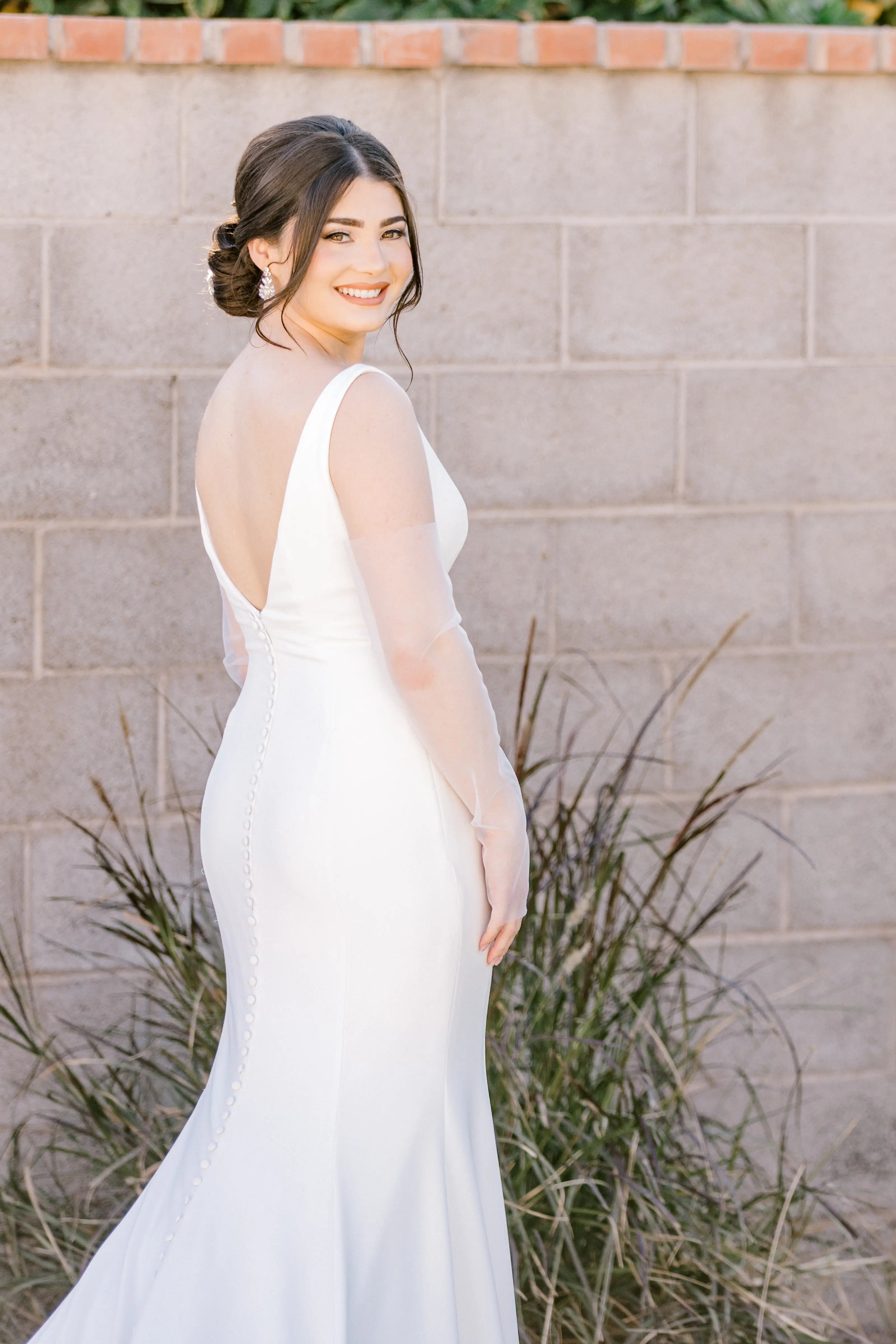Bride In Simple Crepe Wedding Dress Called Fernanda By Maggie Sottero