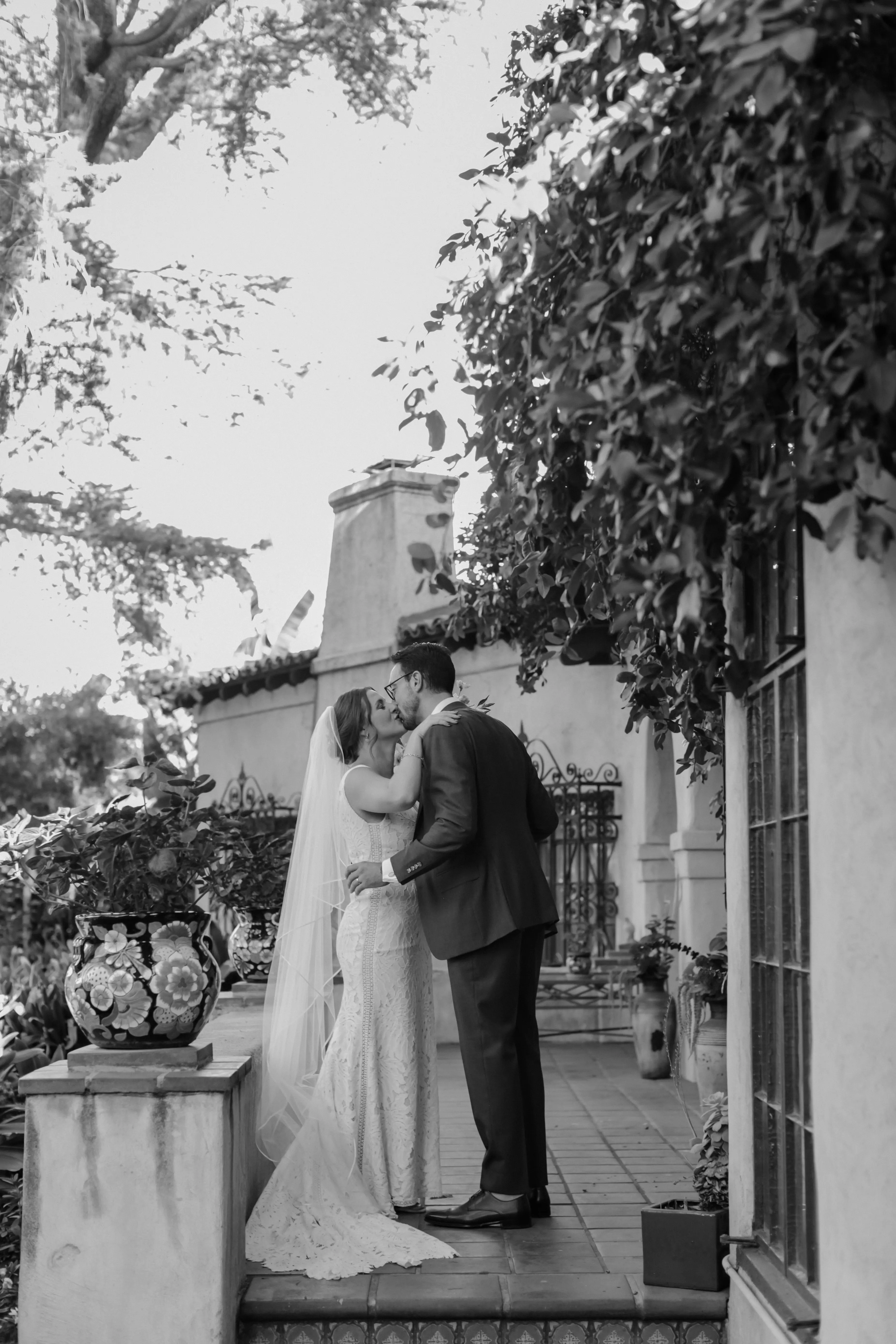 Bride wearing sexy boho lace wedding dress.