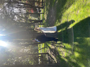 Real bride in sparkly lace fit-and-flare bridal gown with lace motifs over tulle called Fontaine by Maggie Sottero