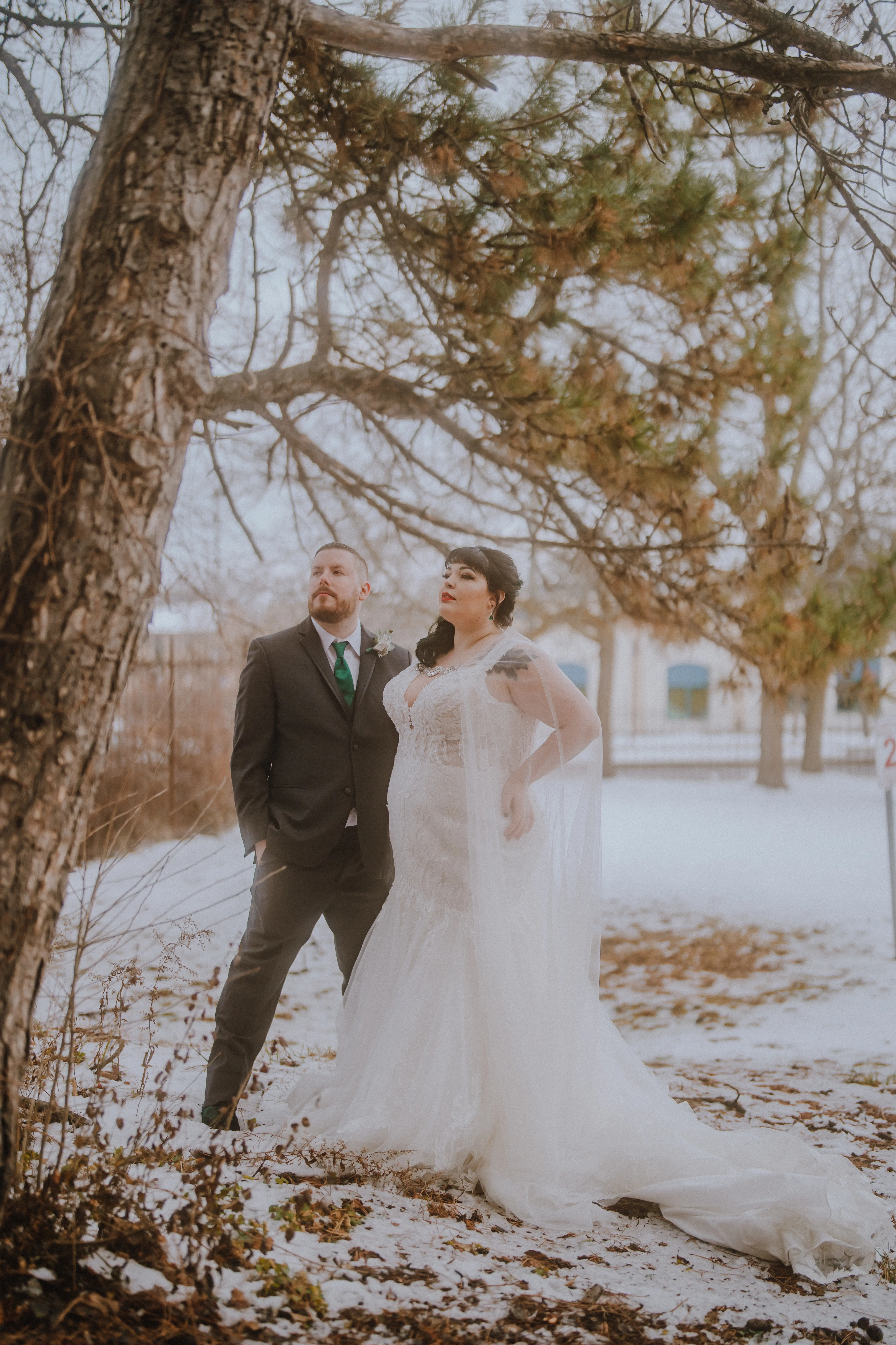 Real Bride in Cap-Sleeve Mermaid Wedding Dress with Lace Motifs and eep V-Neckline Called Joss by Sottero & Midgley