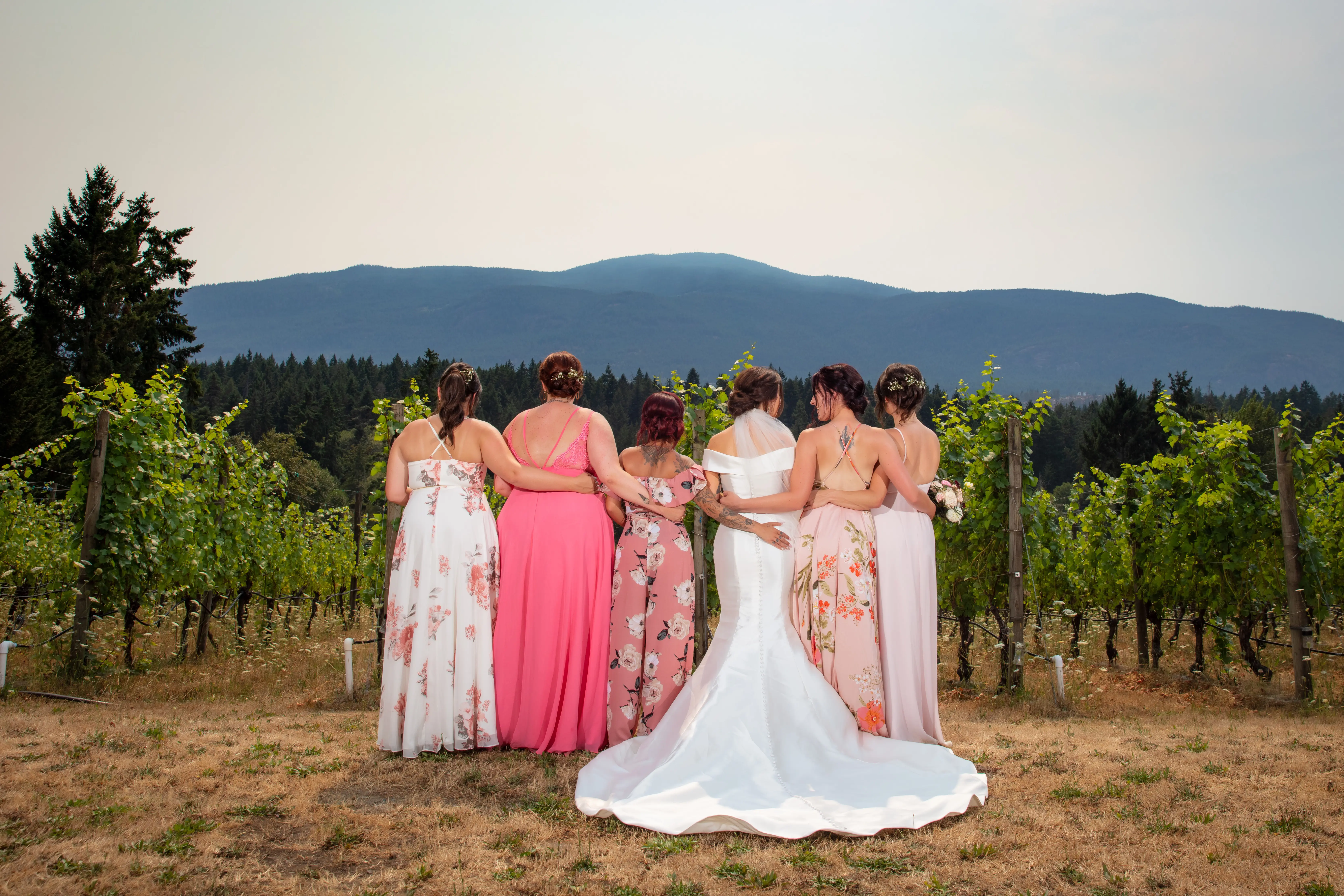 Bride Wearing Simple Classic Wedding Gown Called Josie By Rebecca Ingram With Her Bridesmaids
