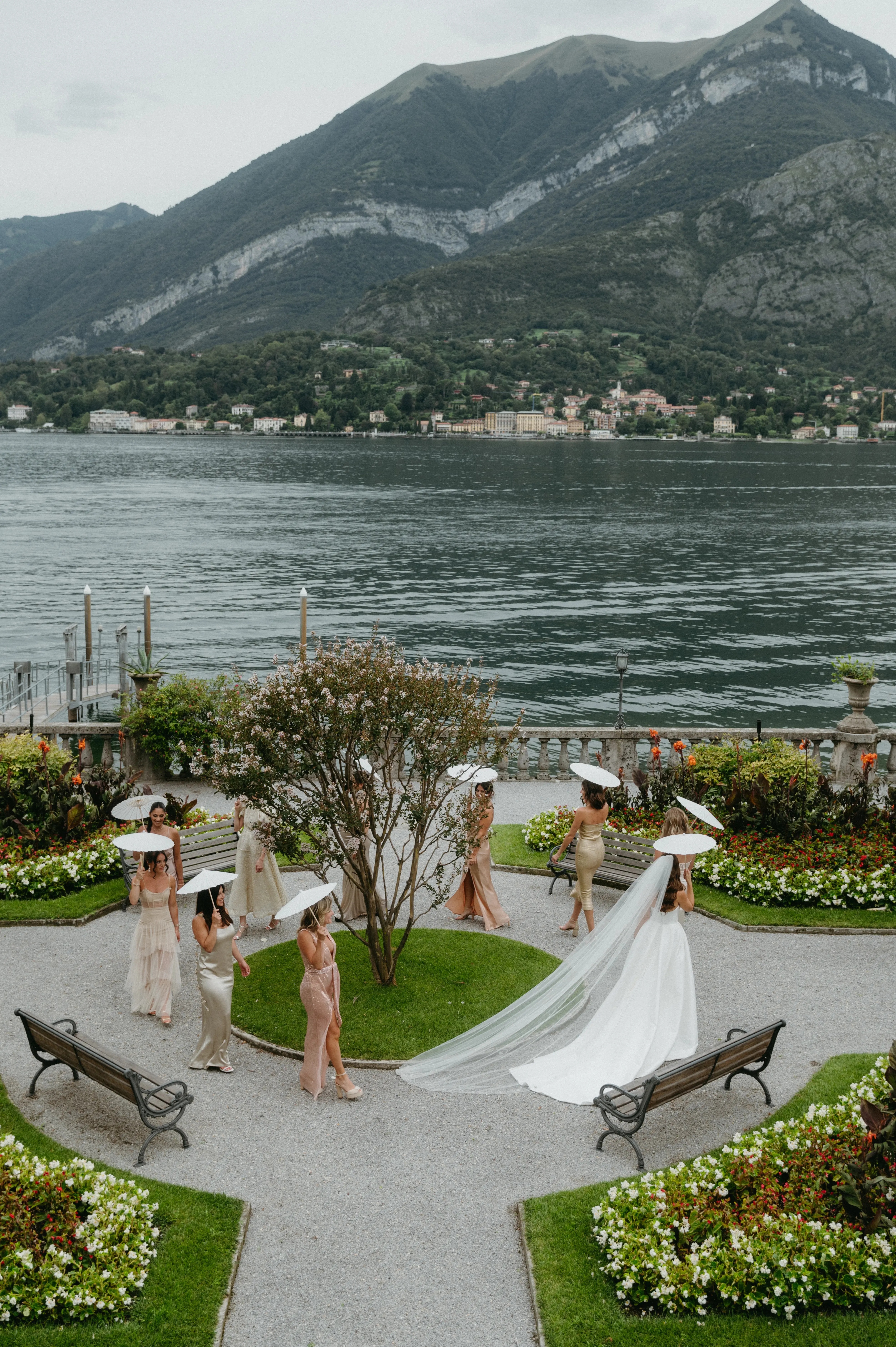 Bride wearing Aspen by Sottero and Midgley walking in a circle with her bridesmaids