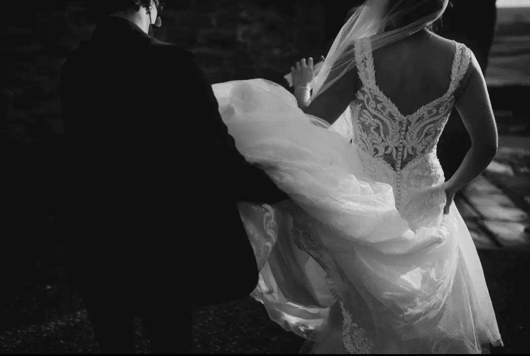 Real Bride in V-Neckline Mermaid Wedding Dress Named Joss by Sottero & Midgley